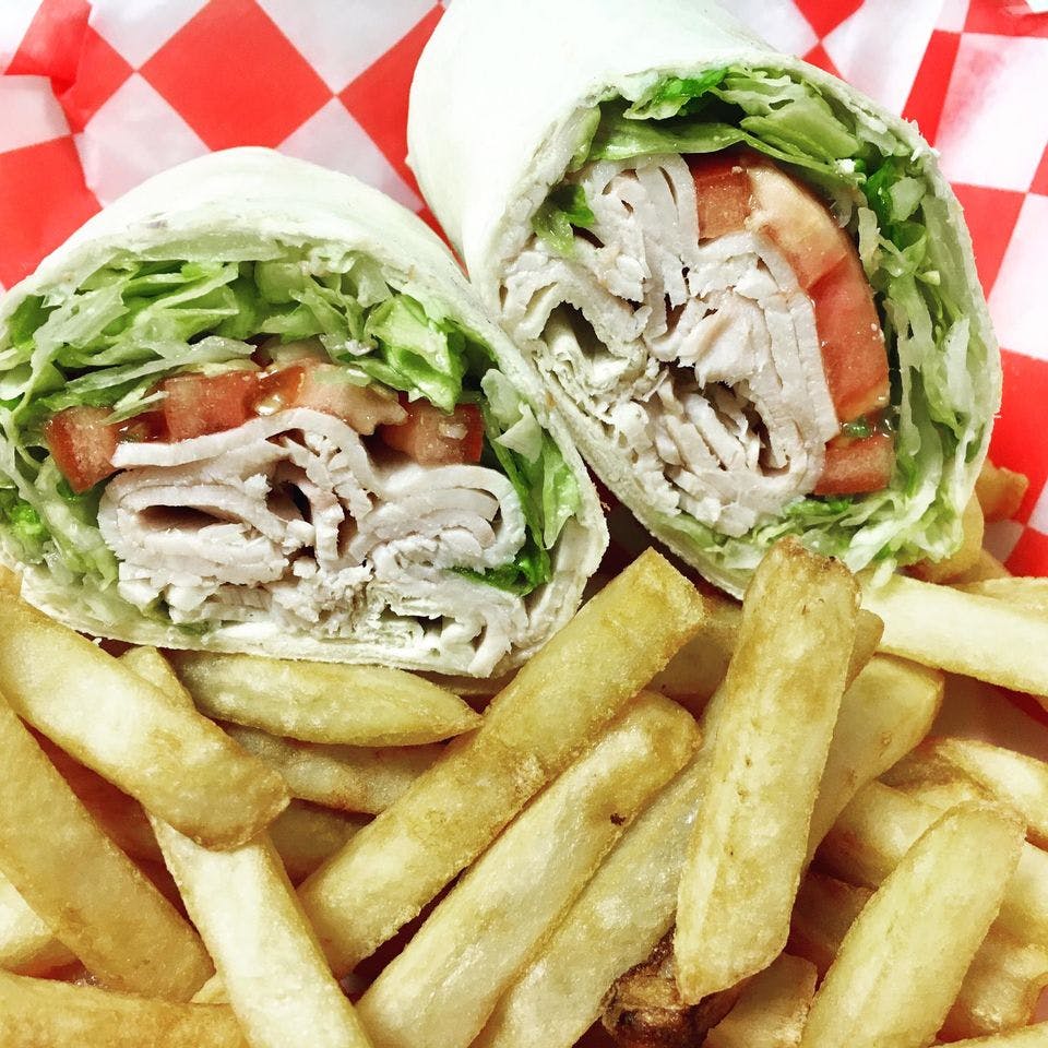 Order Turkey Wrap - Wrap food online from Nino's Pizzarama store, Willow Grove on bringmethat.com