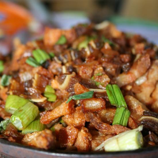 Order Pork Sisig food online from Villa Manila Restaurant store, National City on bringmethat.com