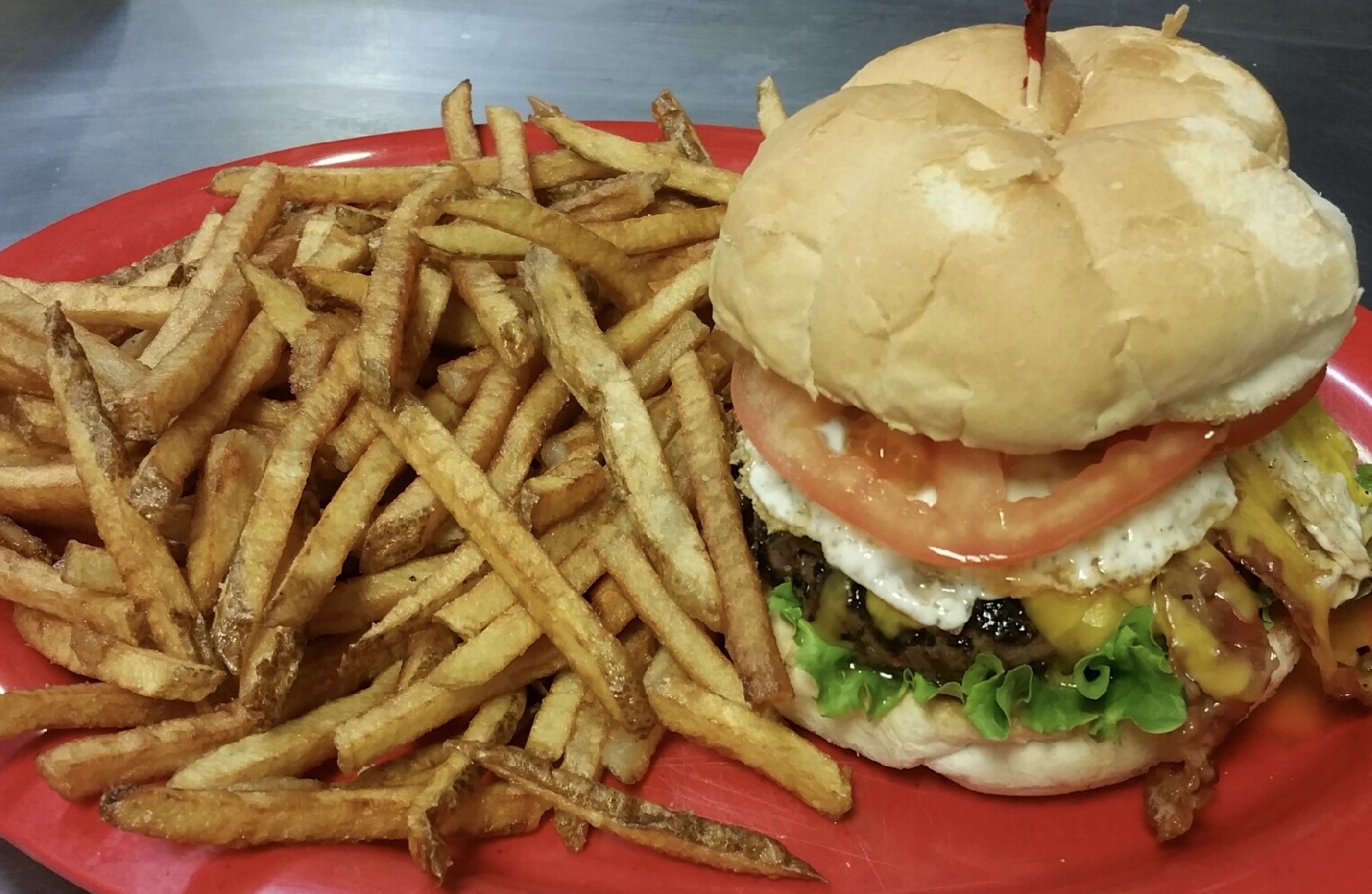 Order 1/3 lb. BLTE Burger food online from Shotz Bar & Grille store, Austintown on bringmethat.com