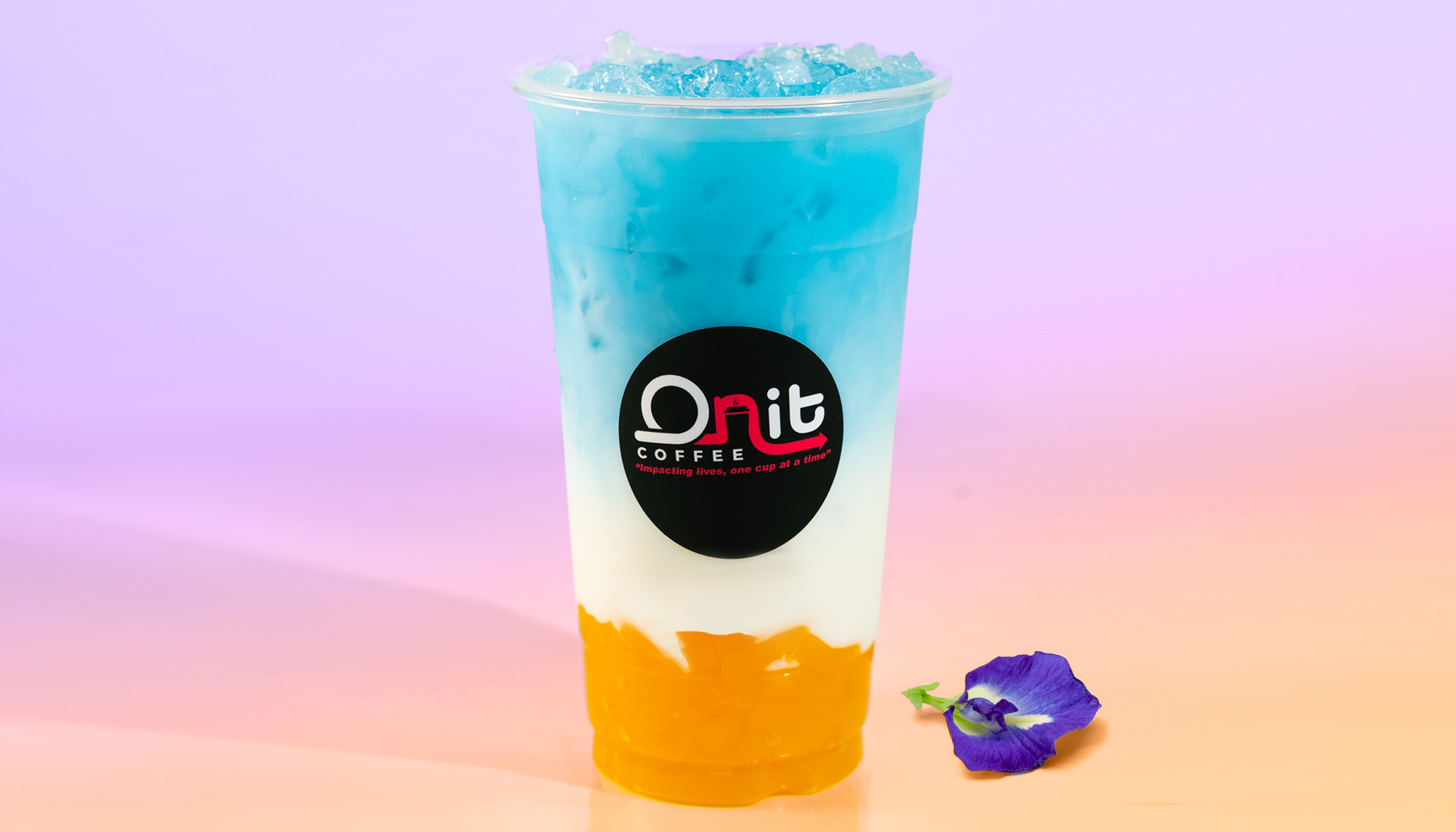 Order Butterfly Milk Tea with Mango Jelly food online from Onit Coffee store, Elk Grove on bringmethat.com