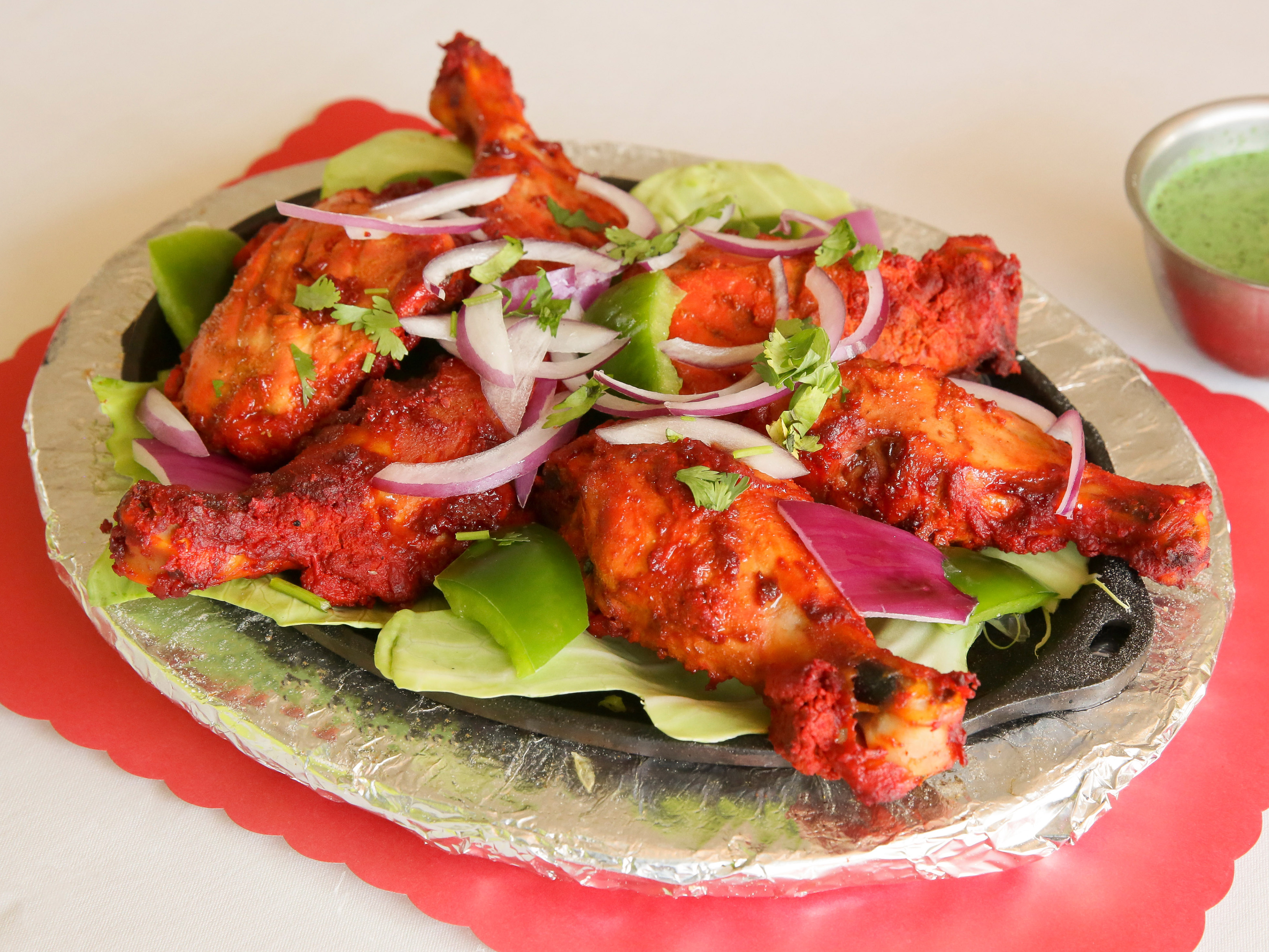 Order 5 Pieces 1/2 Tandoori Chicken food online from Royal India store, Milwaukee on bringmethat.com