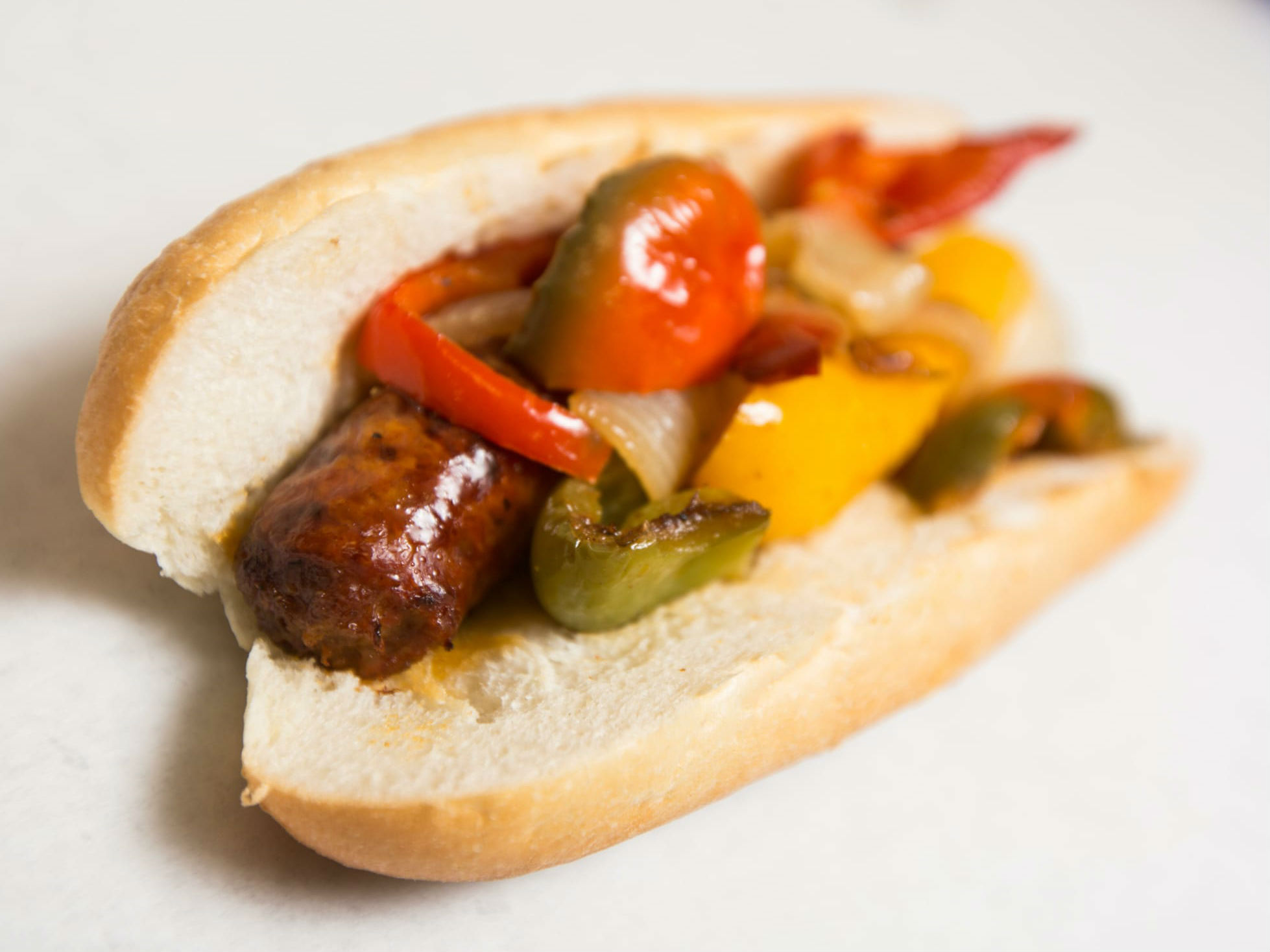 Order Italian Sausage and Peppers on Italian Roll food online from Reen Deli store, Philadelphia on bringmethat.com