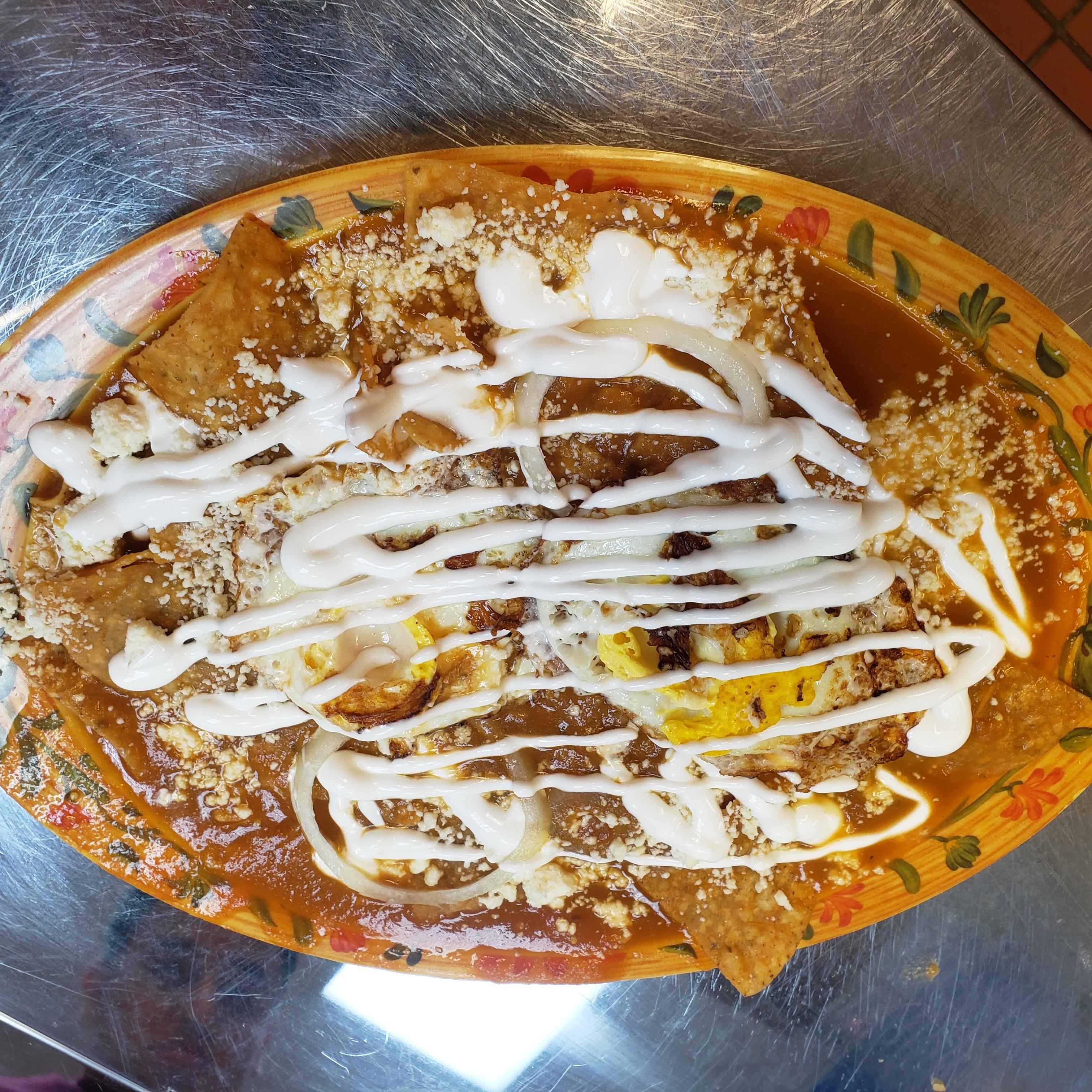 Order Chilaquiles with eggs food online from Tony Tacos Downtown store, Bloomington on bringmethat.com