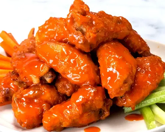 Order 12PCS CHICKEN WINGS food online from Halal Munchies store, New York on bringmethat.com