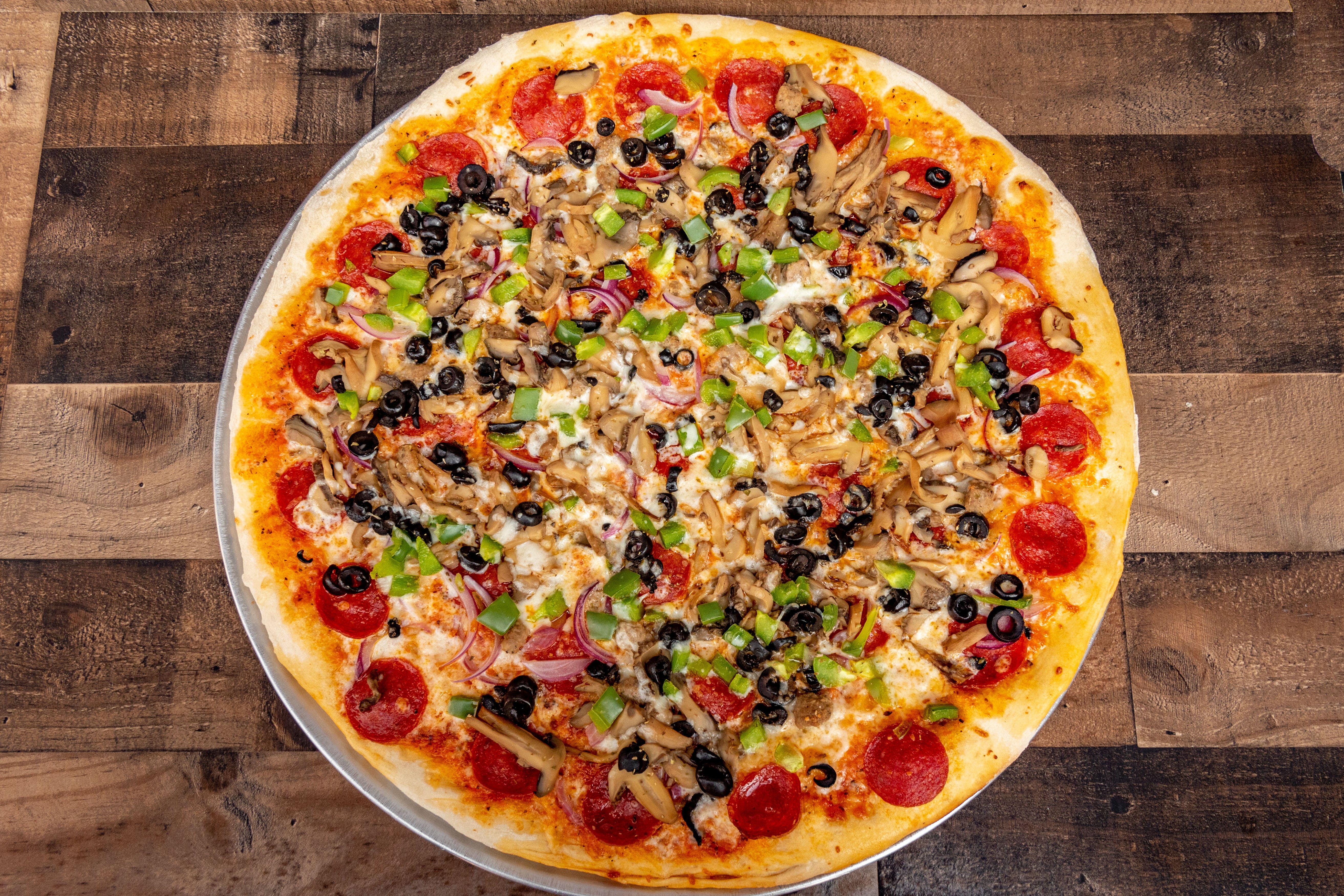 Order Supreme Pizza 18" - 8 Slices food online from San Remo Pizzeria store, San Diego on bringmethat.com