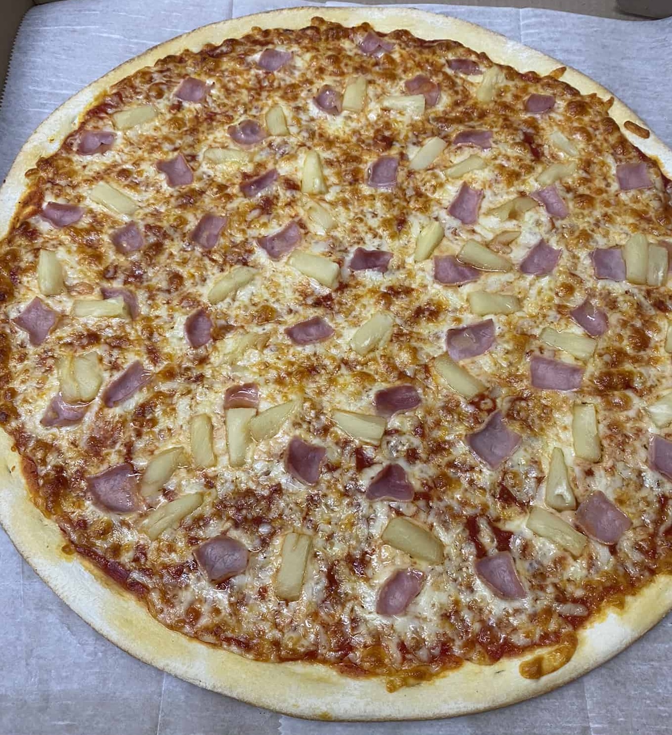 Order 18" Hawaiian food online from Famous Pizza store, Paramus on bringmethat.com