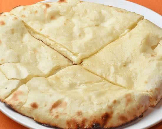Order Onion Cheese Stuffed naan food online from Rajput Indian Cuisine store, Norfolk on bringmethat.com