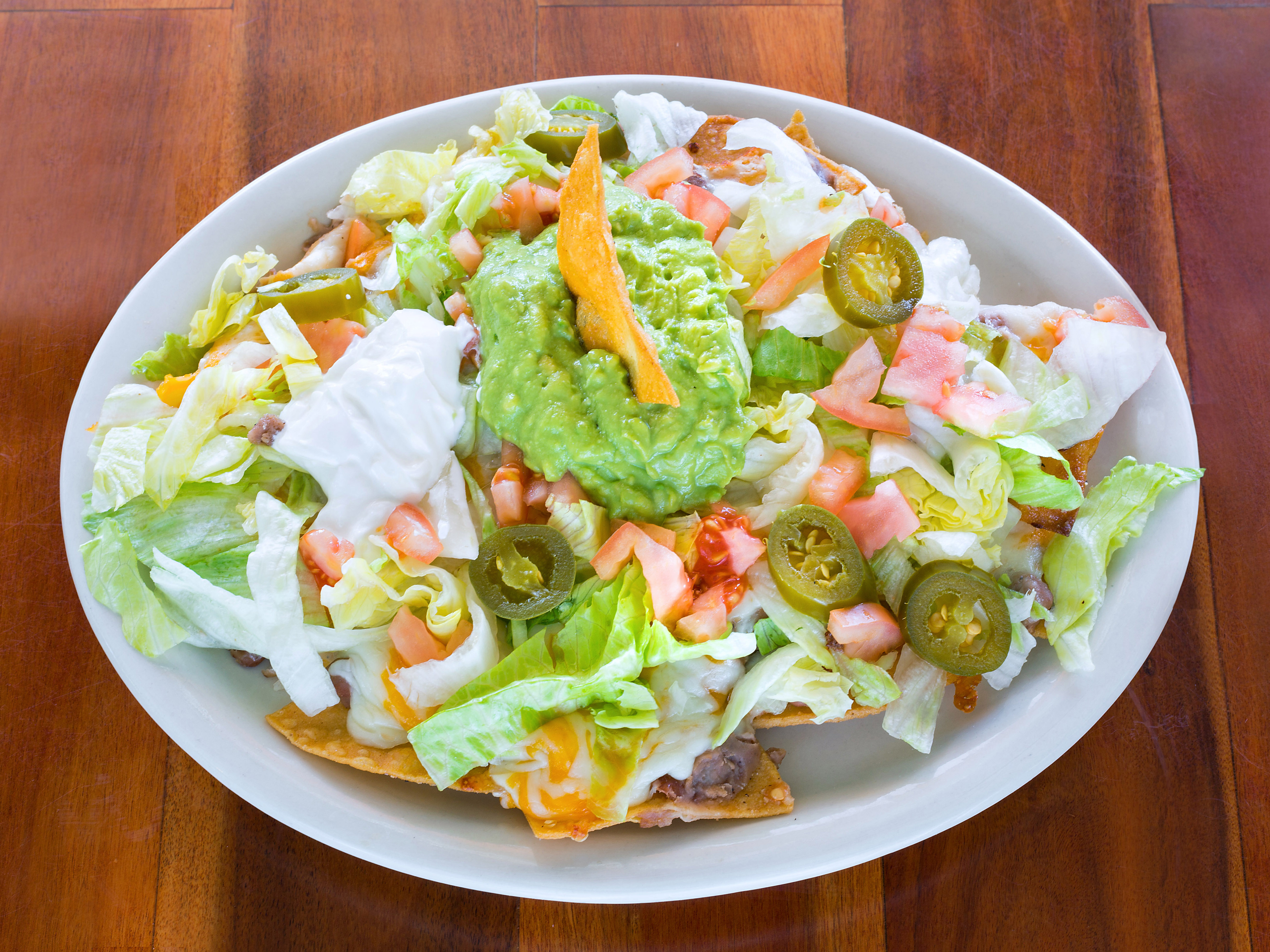 Order Supreme Nachos food online from Babe's Old Fashioned Food store, San Antonio on bringmethat.com