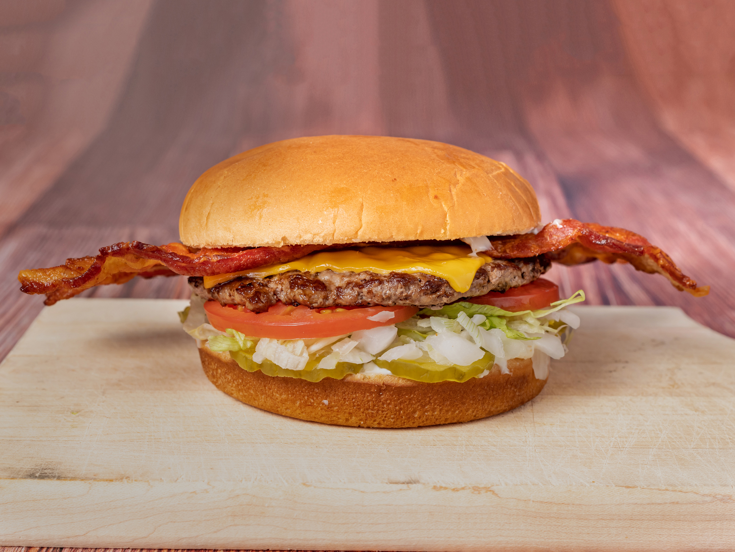 Order Bacon Cheeseburgers food online from Tops Bar-B-Q store, Southaven on bringmethat.com