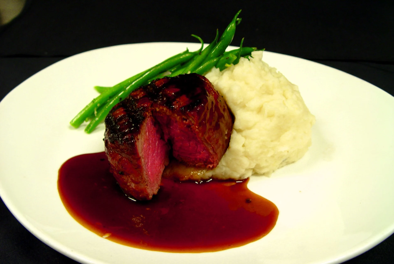 Order 8 Oz. Center Cut Filet Mignon food online from Elevation Chophouse And Skybar store, Kennesaw on bringmethat.com