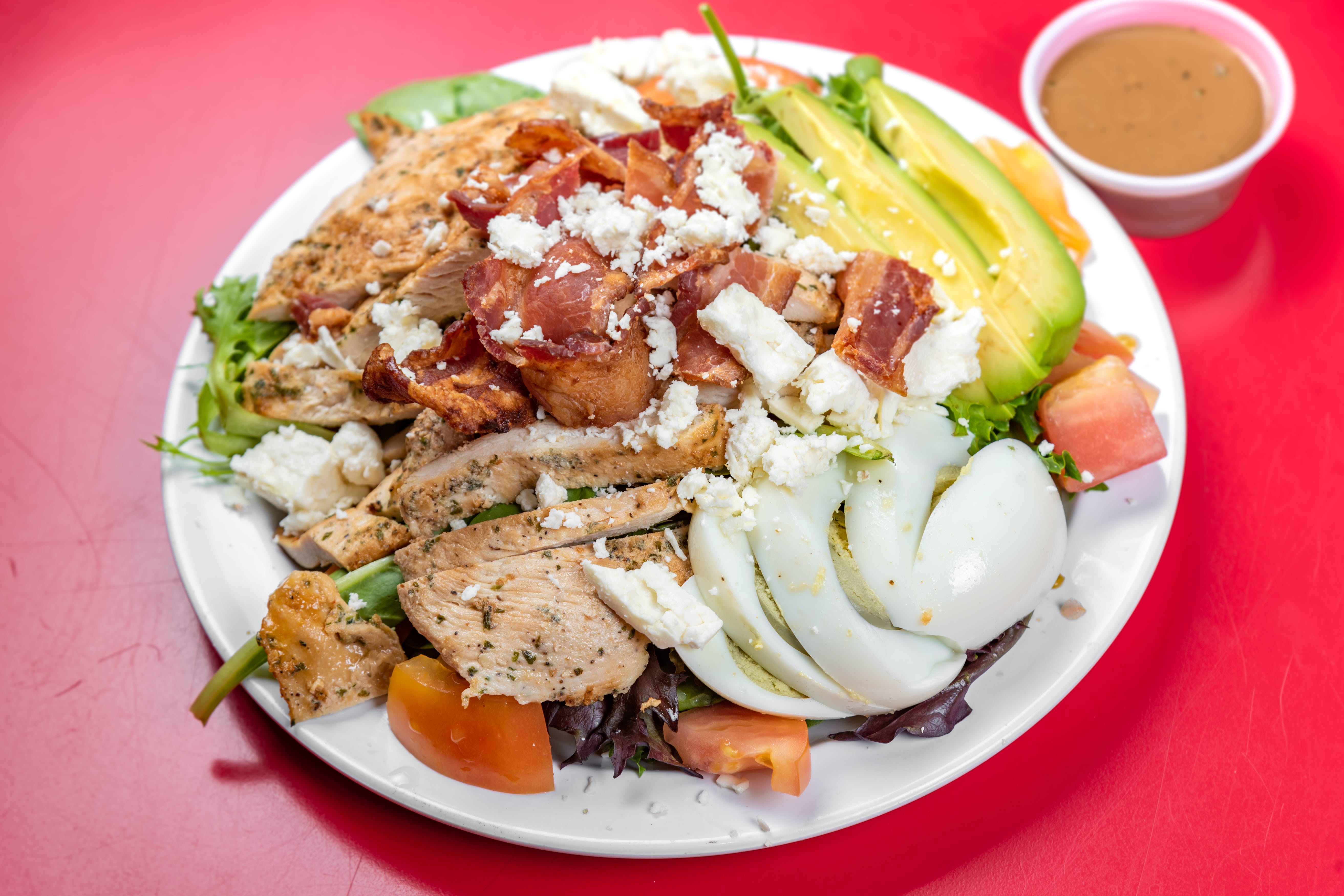 Order Cobb Salad - Salad food online from The Grotto Pizzeria store, New York on bringmethat.com