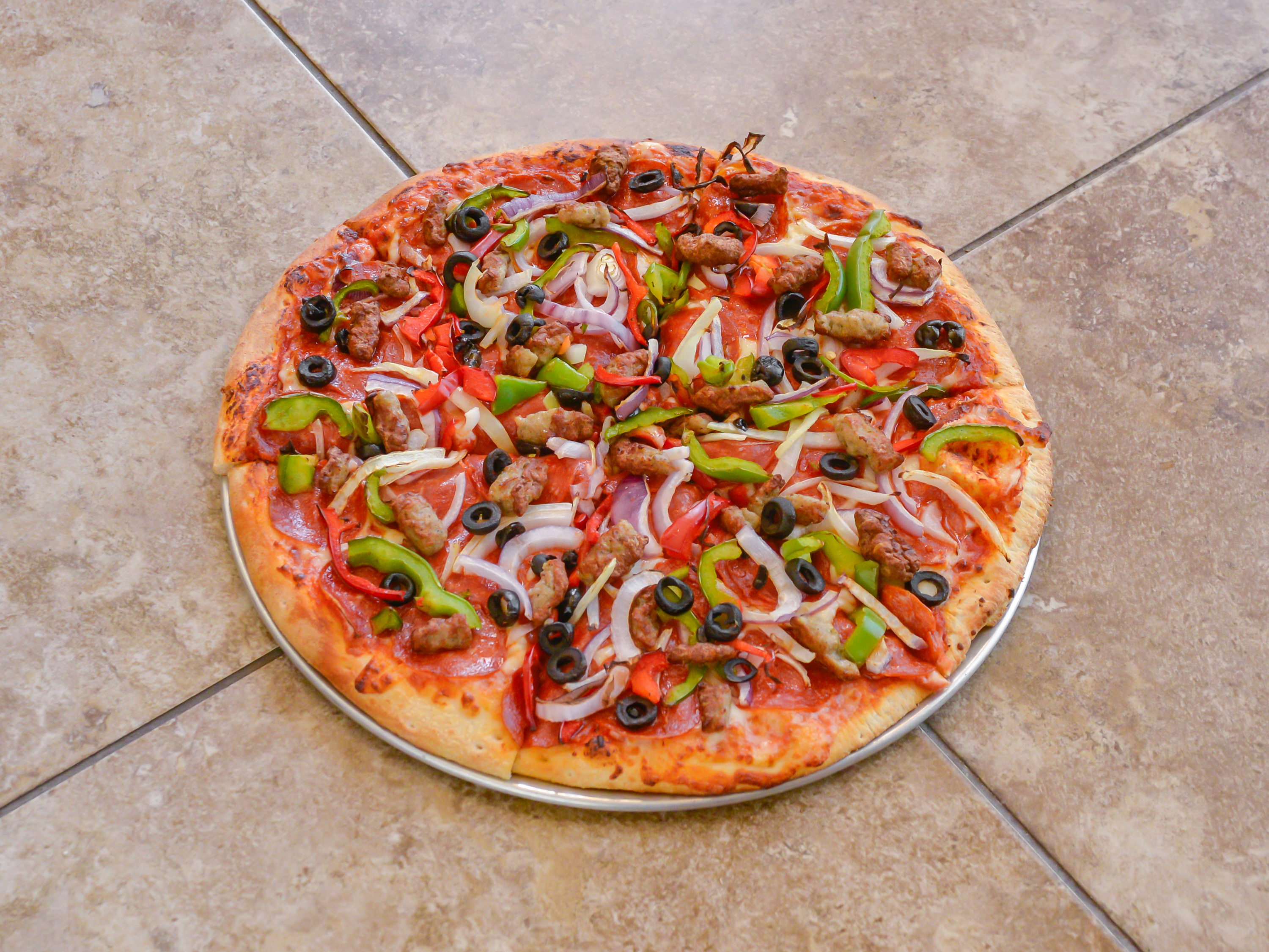 Order California Combination food online from New York Pizza & Grill store, Dinuba on bringmethat.com