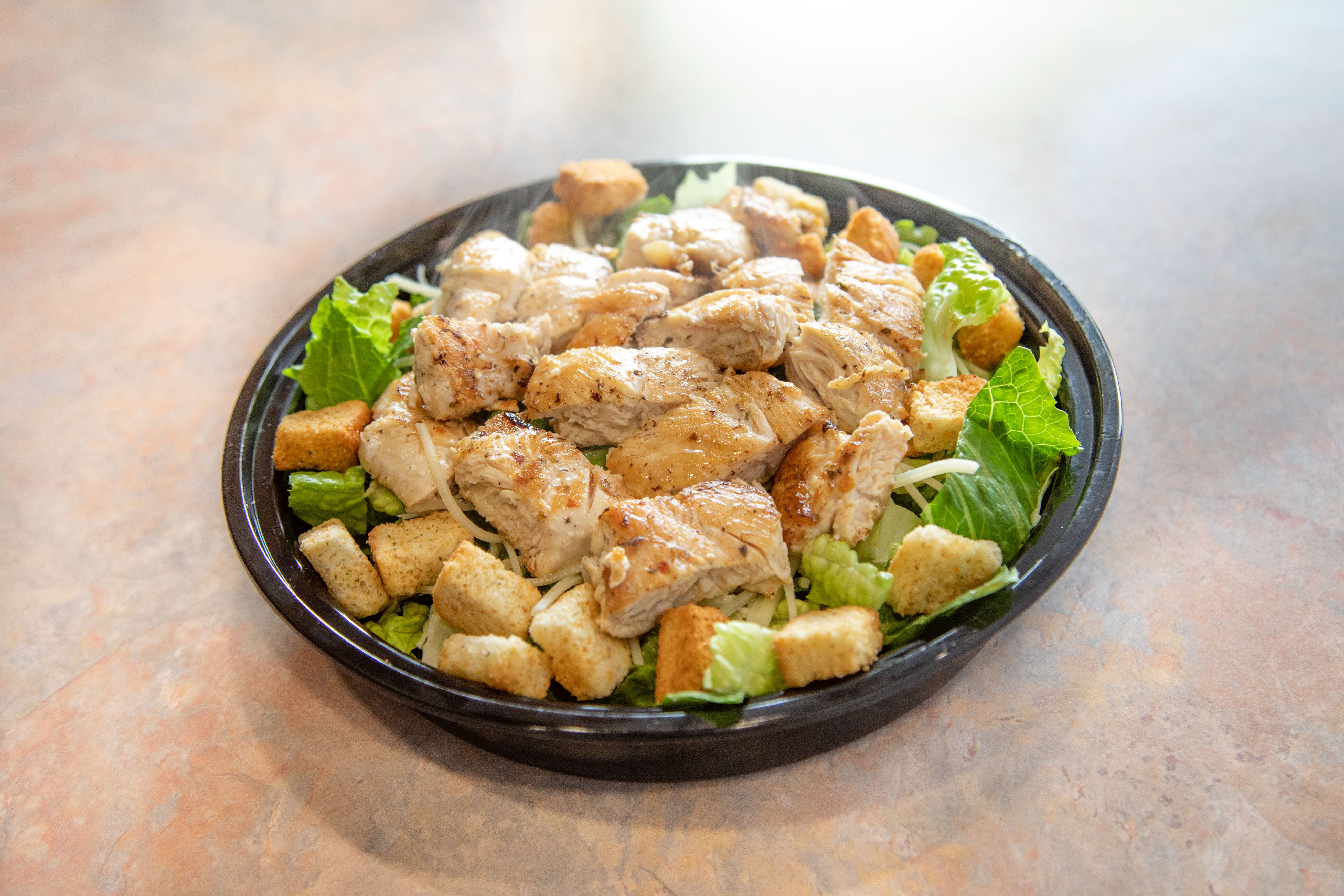 Order Chicken Caesar Salad - Chicken Caesar Salad food online from Bruno's Pizza store, Springfield on bringmethat.com