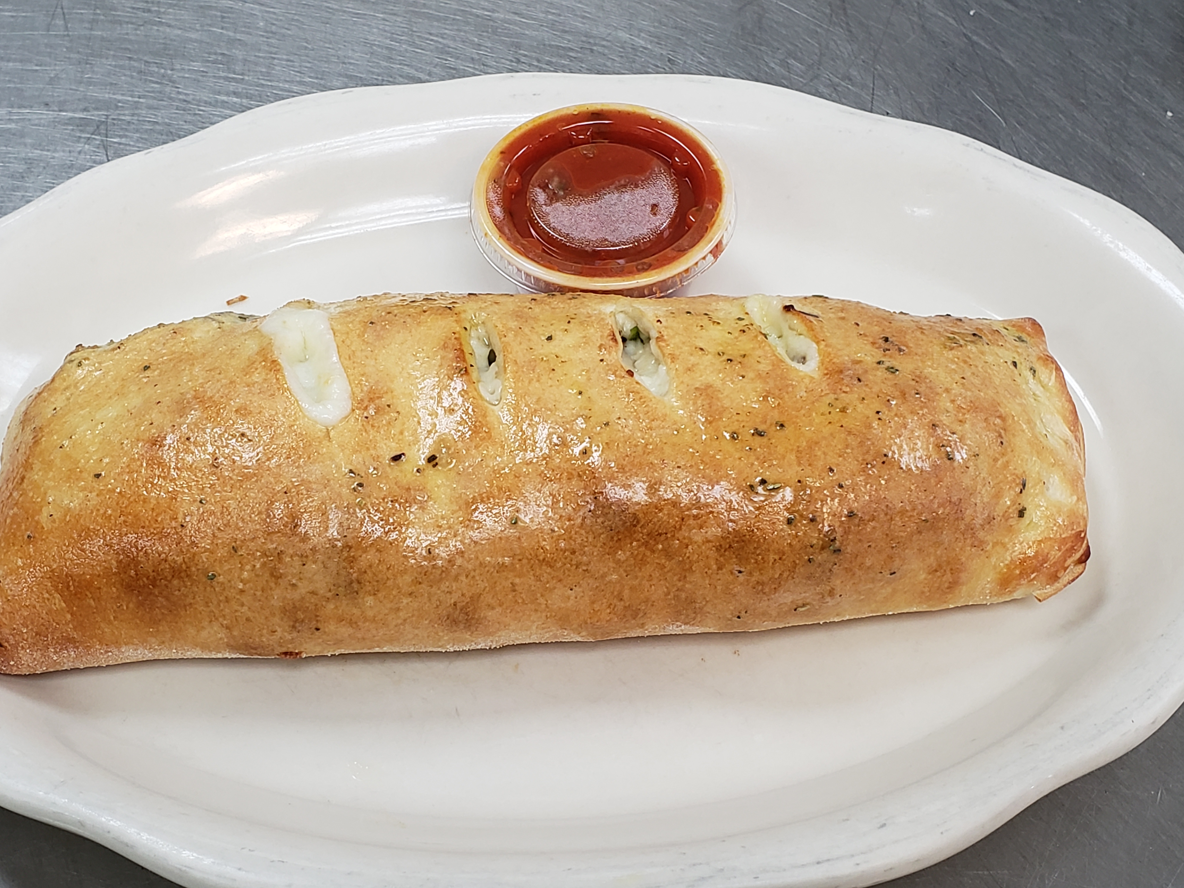 Order Pepperoni Stromboli food online from Illianos Pizza store, Clemmons on bringmethat.com