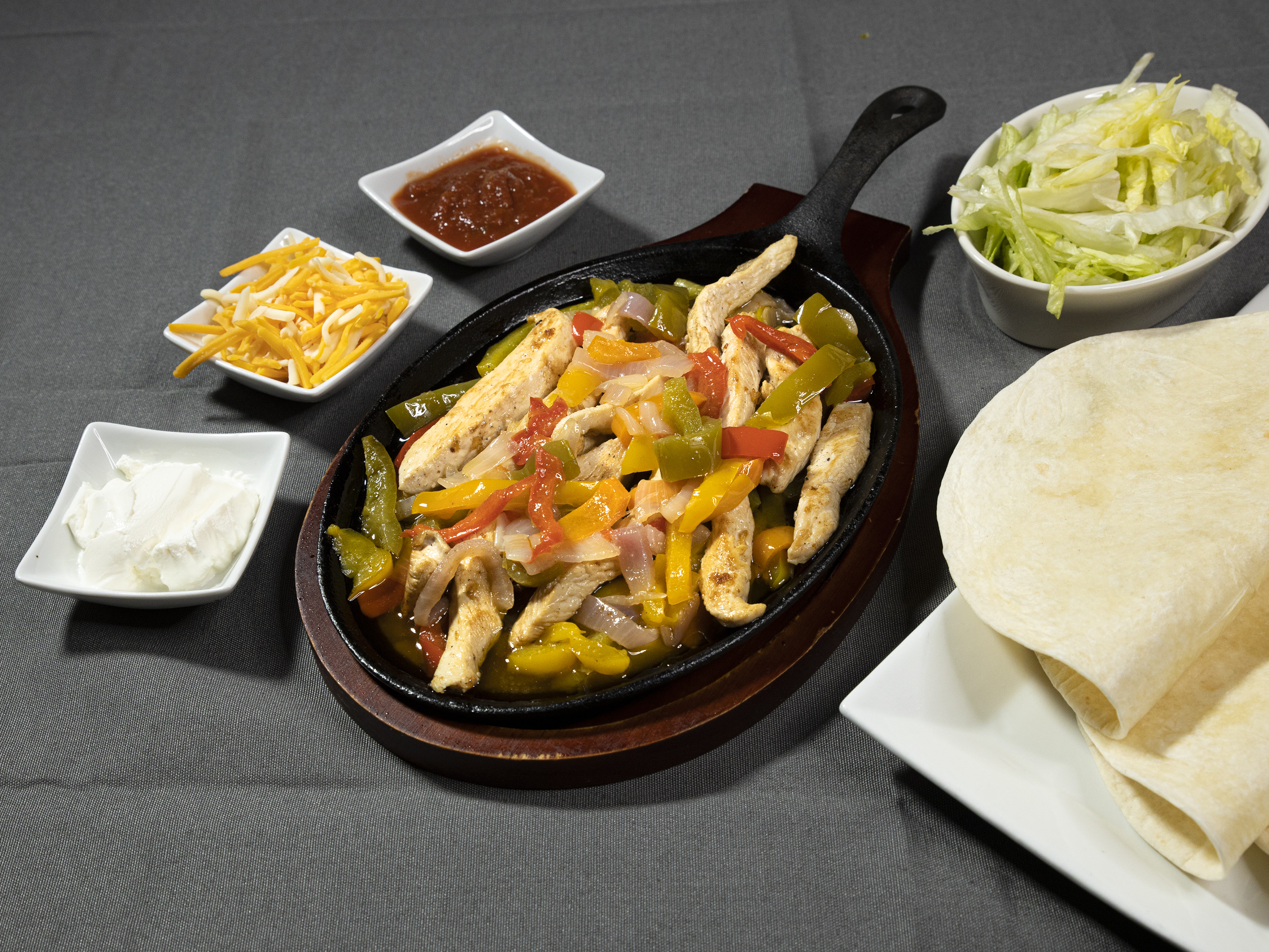 Order Chicken Fajita food online from Fusion Spice Bar & Grille store, Wilmington on bringmethat.com
