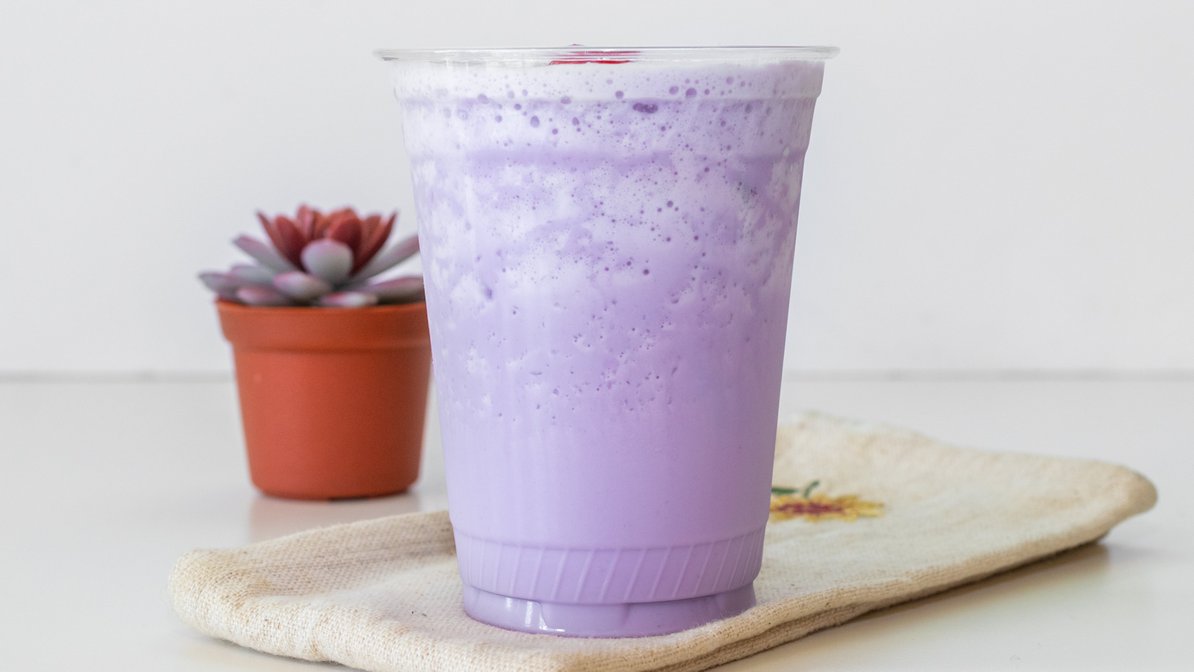 Order Taro Milk Tea Frappe food online from Tutti Frutti Frozen Yogurt store, Sugar Land on bringmethat.com