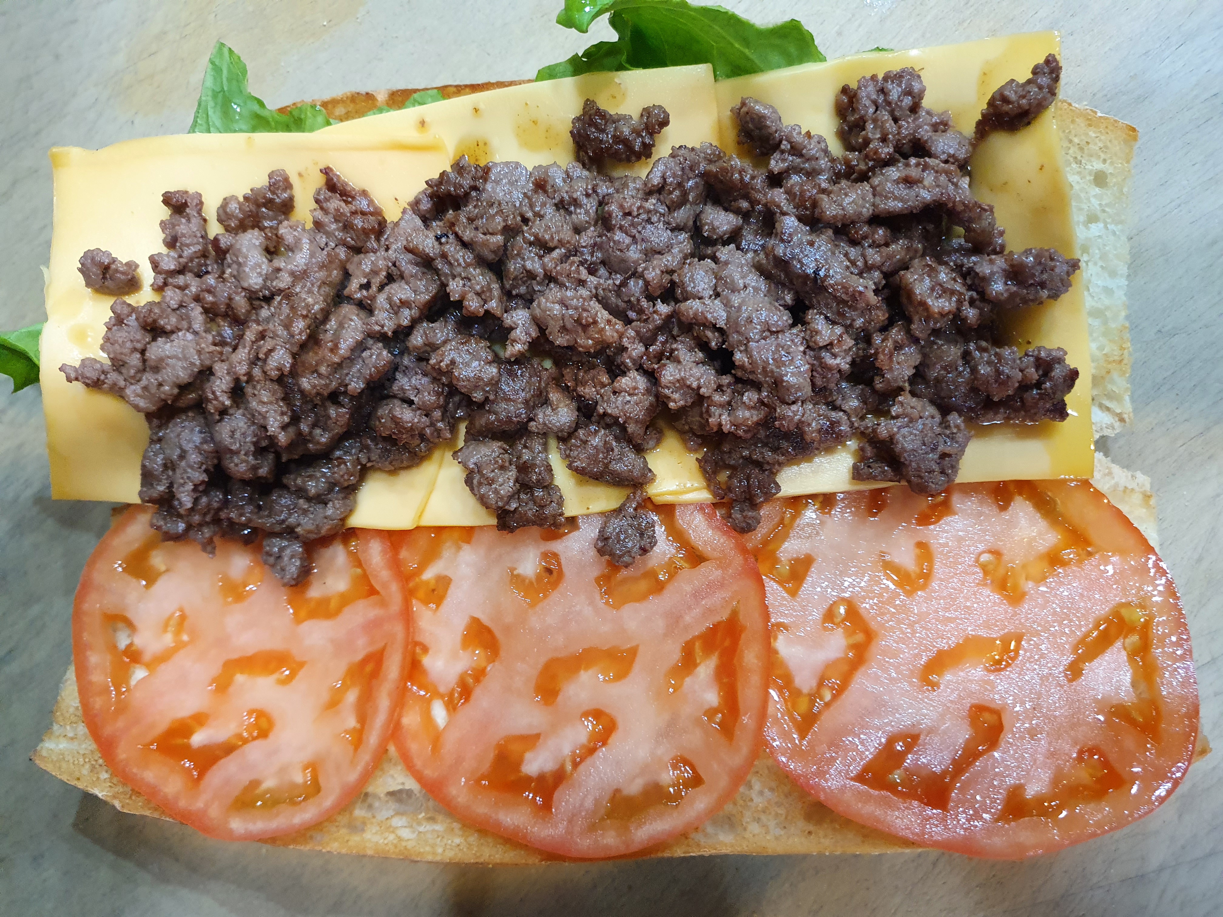 Order EV28. Chopped Cheese Sandwich food online from East Village New Deli store, New York on bringmethat.com