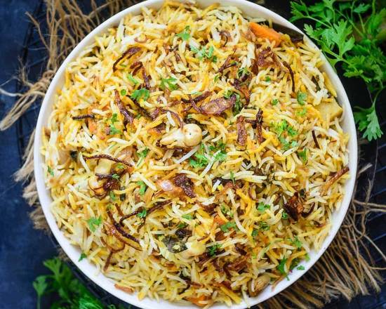 Order Veg Biryani food online from Baisakhi Dhaba store, Topeka on bringmethat.com