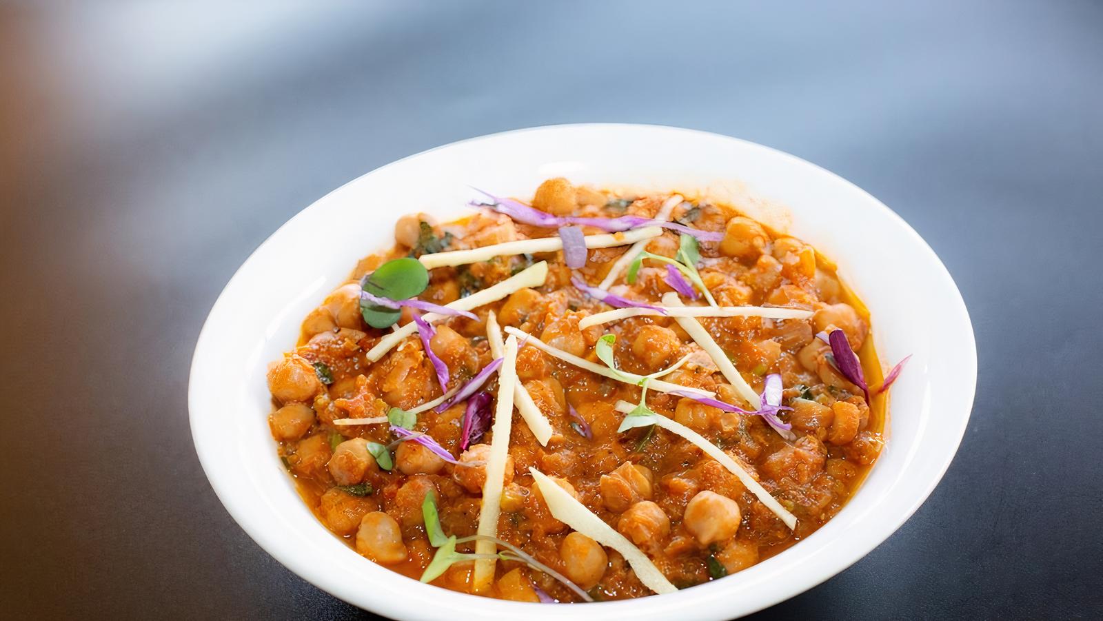Order Chana Masala Curry food online from Masala Desi Cafe store, Burlingame on bringmethat.com
