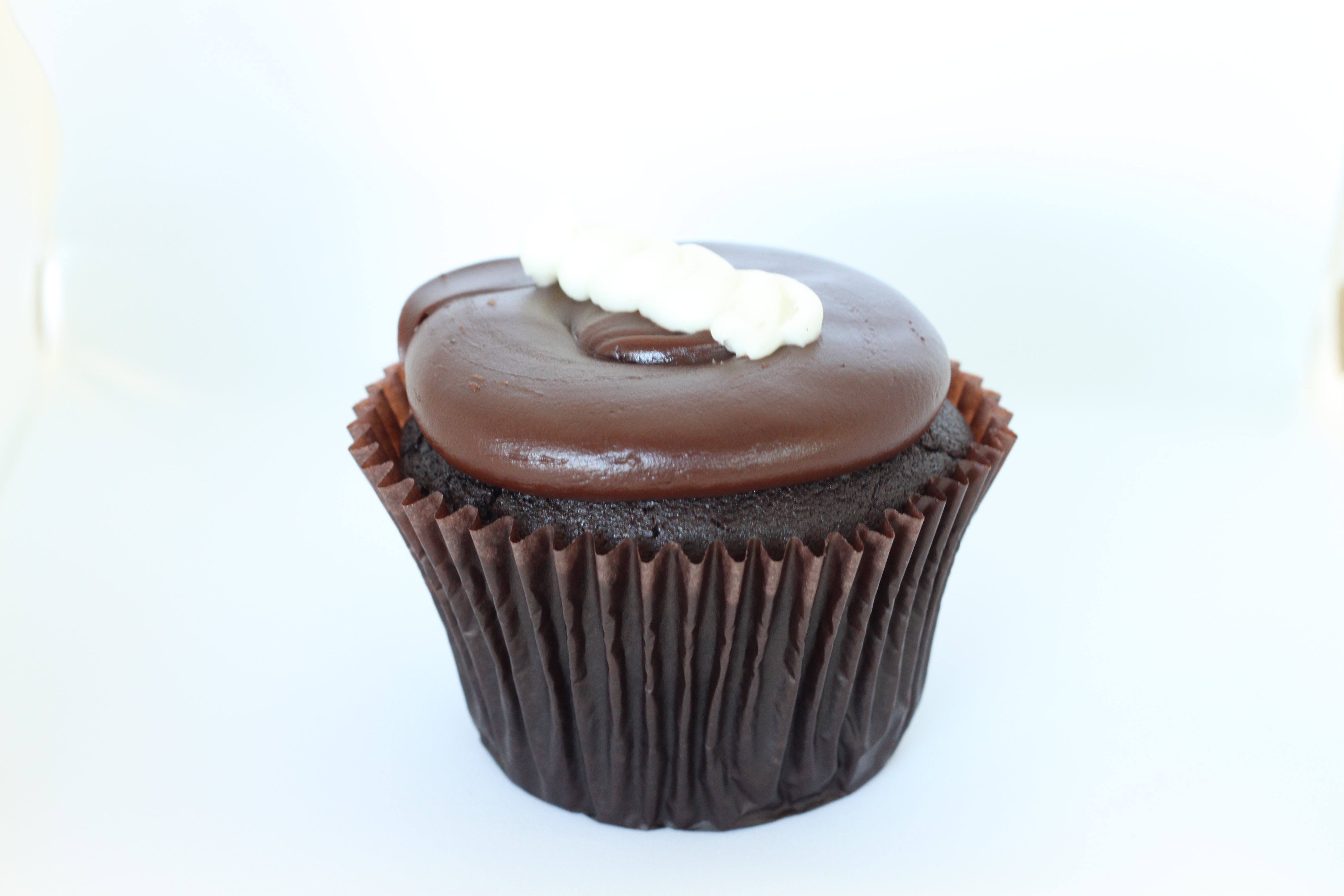 Order Chocolate Cream Cupcake food online from Smallcakes Cupcakery And Creamery store, Garhanna on bringmethat.com