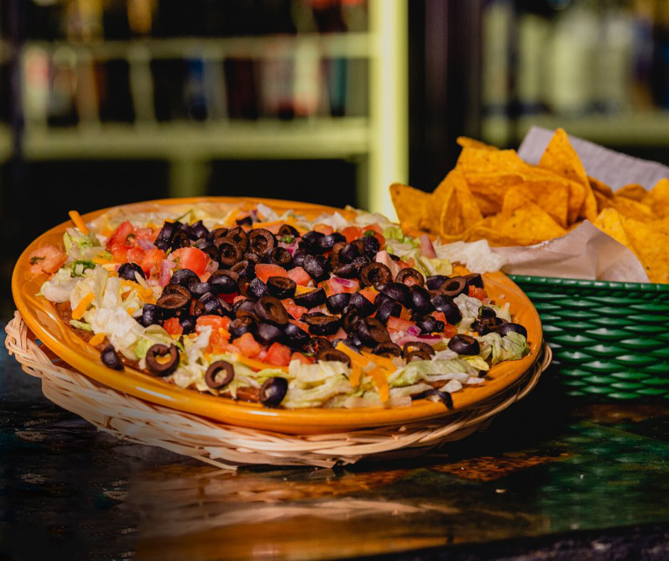 Order 7 Layer Dip food online from Mexican Village store, Fargo on bringmethat.com