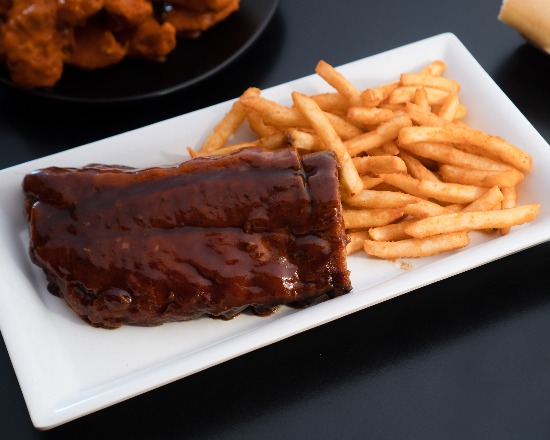 Order Half Rack Meaty Baby Back Ribs food online from Buffalo Wing Star store, San Diego on bringmethat.com