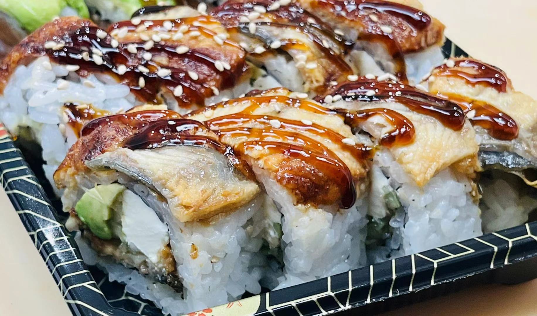 Order Eel Dragon Special Roll food online from Nikki's Sushi store, Wilmington on bringmethat.com