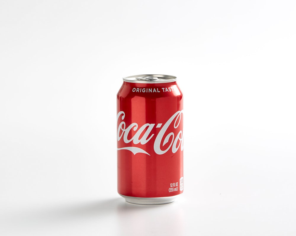 Order Coke Can food online from Luna Grill store, San Diego on bringmethat.com
