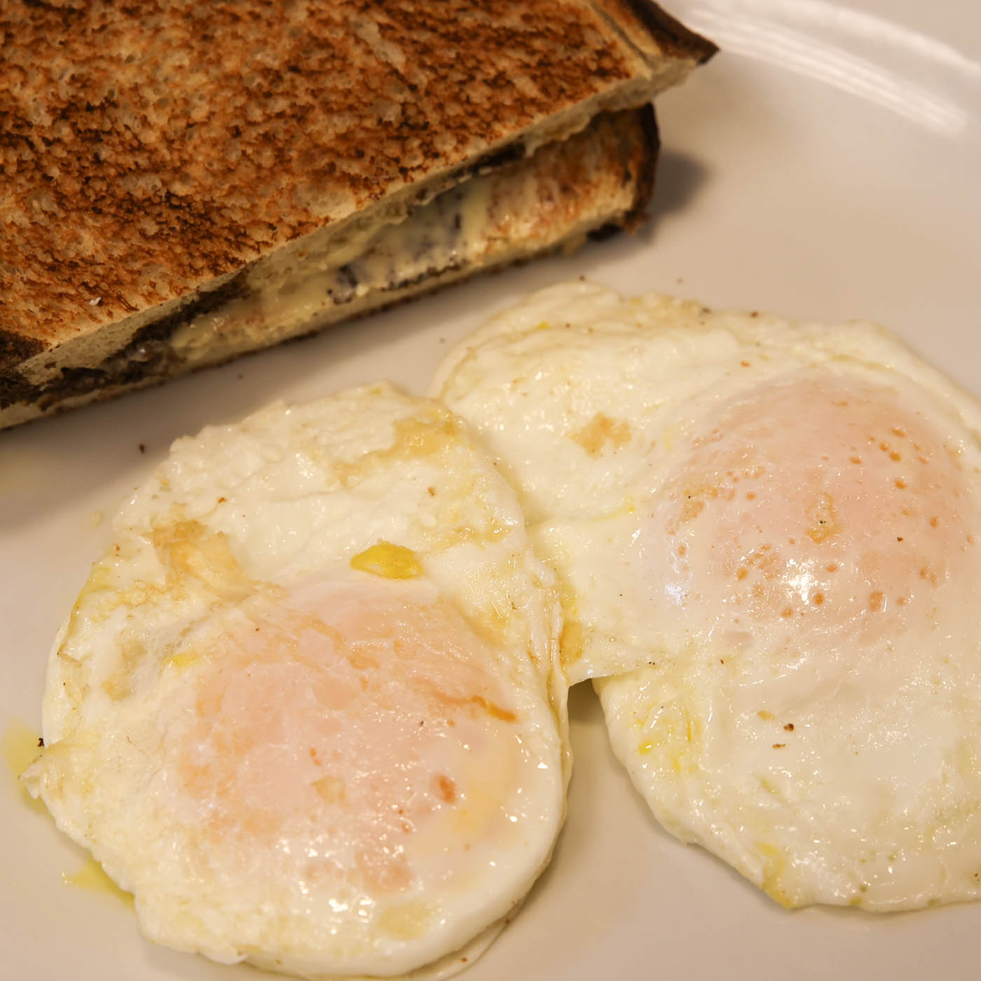 Order 2 Eggs and Toast food online from Sunny Street Cafe store, Painesville on bringmethat.com