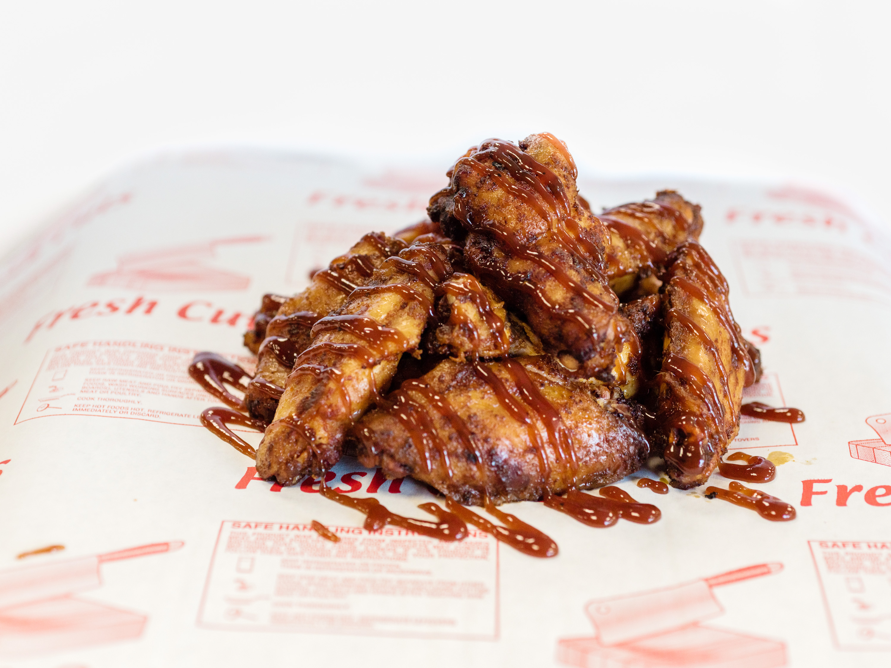 Order Chicken Wings a la Carte food online from Millers Meat Bbq And Catering store, Findlay on bringmethat.com