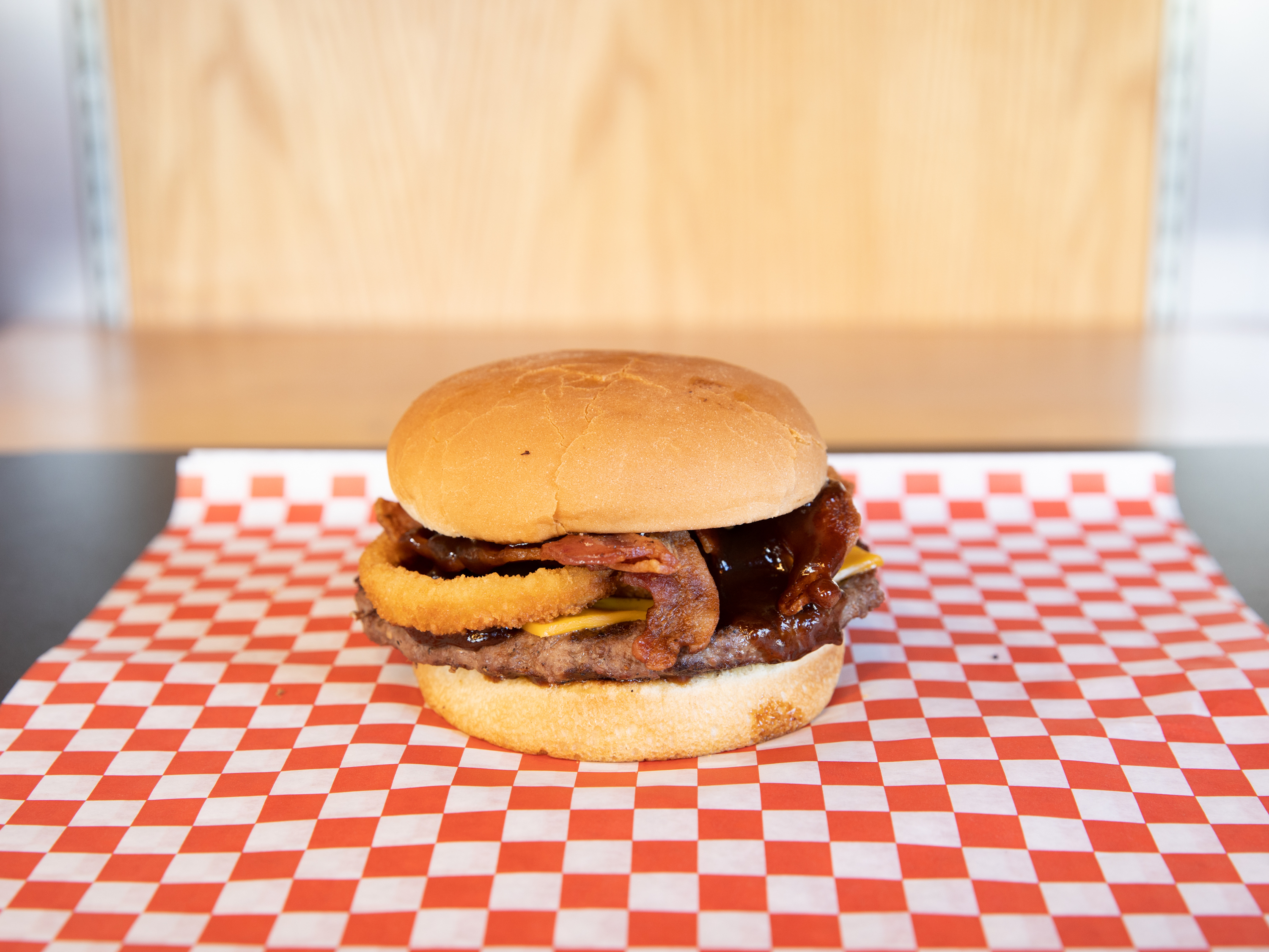 Order BBQ Bacon Burger food online from Bomburger store, Huntington Beach on bringmethat.com