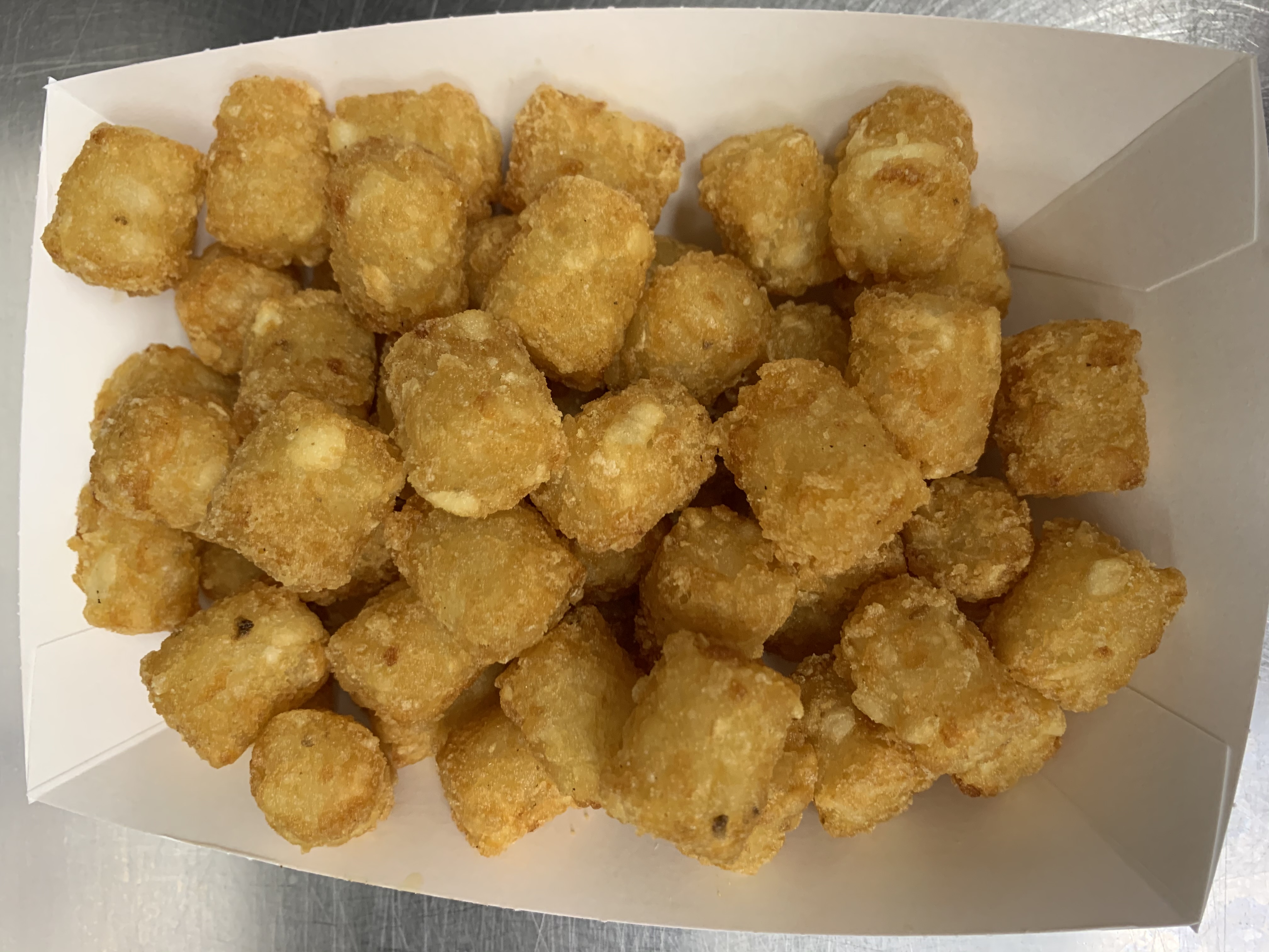 Order Basket of Tater Tots food online from 1st Place Sports Bar store, Hoffman Estates on bringmethat.com