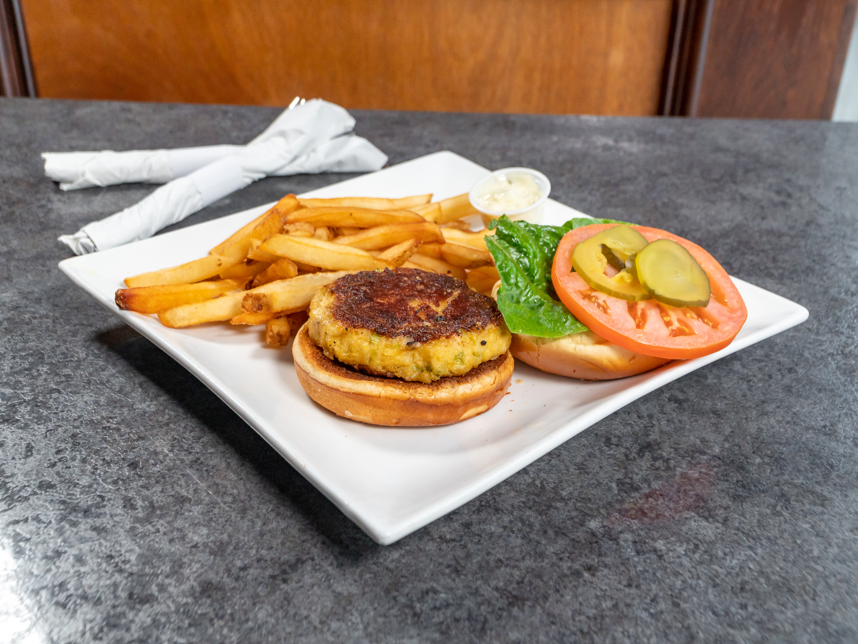 Order Crab Cake Sandwich food online from The Exchange Saloon store, Washington on bringmethat.com