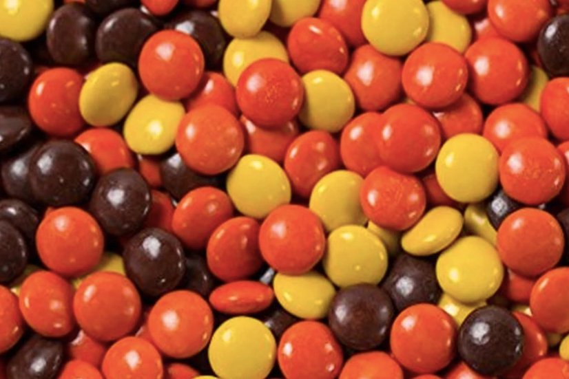 Order Reese’s Pieces (pint) food online from Ben & Jerry's store, Plano on bringmethat.com