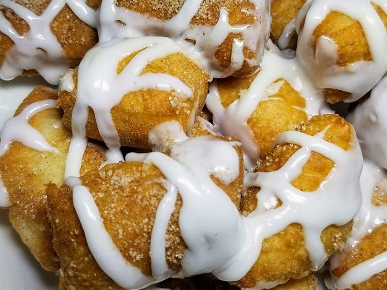 Order Frosted Cinnamon Bites food online from Clockwork Pizza store, Tempe on bringmethat.com