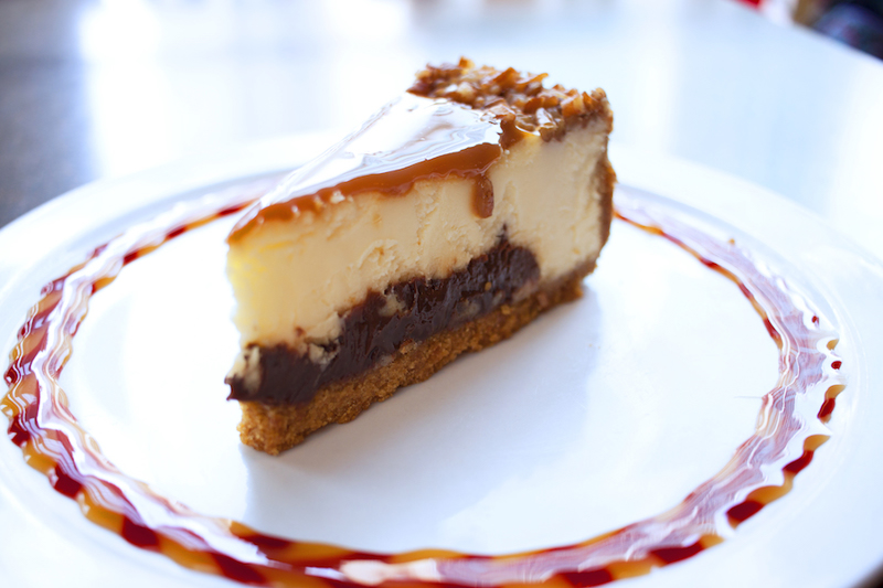 Order Turtle Cheesecake food online from Press Box Grill store, Dallas on bringmethat.com