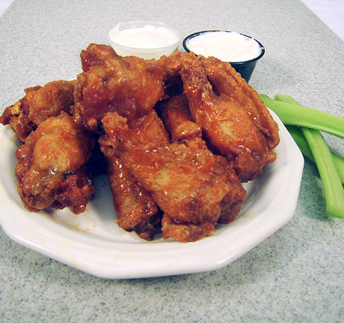 Order Buffalo Wings (Bone-in) food online from Calz Pizza Subs & Chicken Wings store, Virginia Beach on bringmethat.com