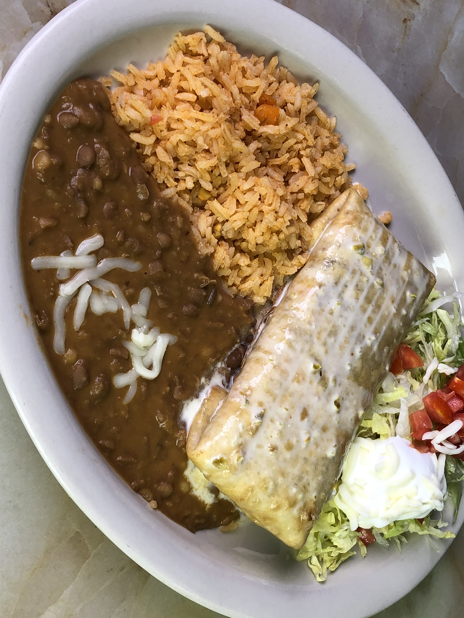 Order CHIMICHANGA food online from Oasis Mexican Grill store, Springdale on bringmethat.com