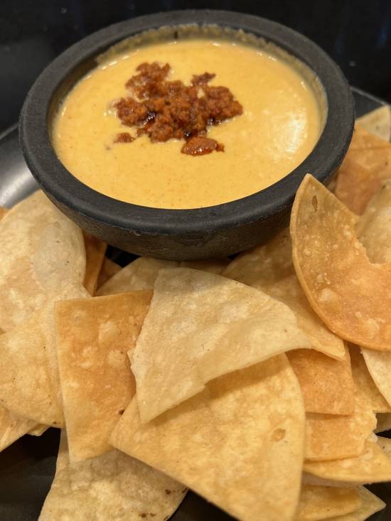 Order Queso Dip food online from El Luchador Mexican Kitchen + Cantina store, Enterprise on bringmethat.com