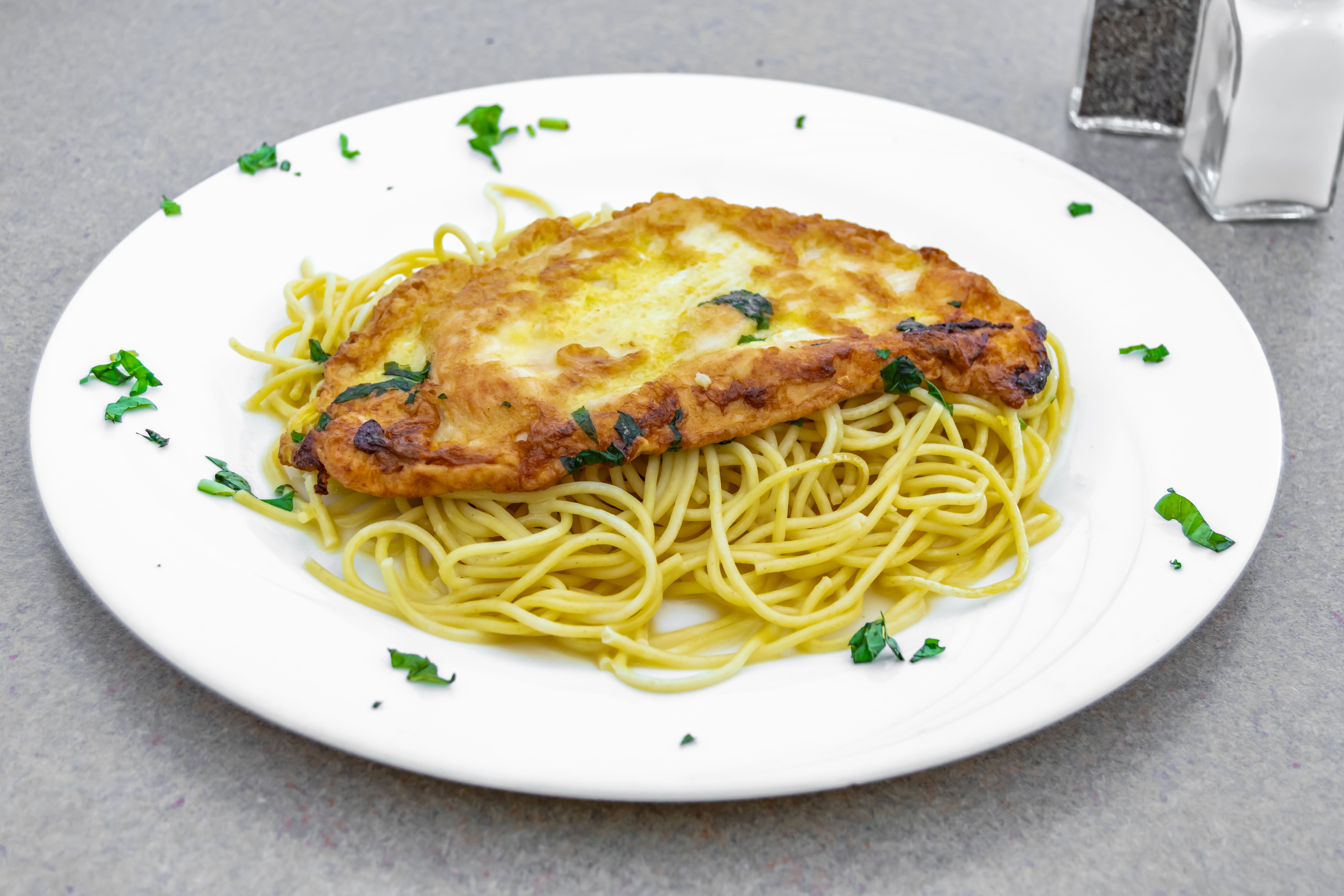 Order Chicken Francese Over Pasta Lunch - Lunch food online from Bella Pizza 2 store, Somerset on bringmethat.com