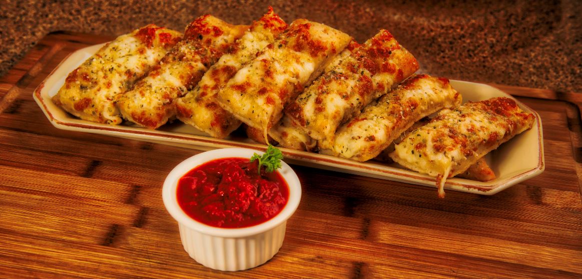 Order Garlic Breadsticks food online from Pat Pizzeria store, Ithaca on bringmethat.com