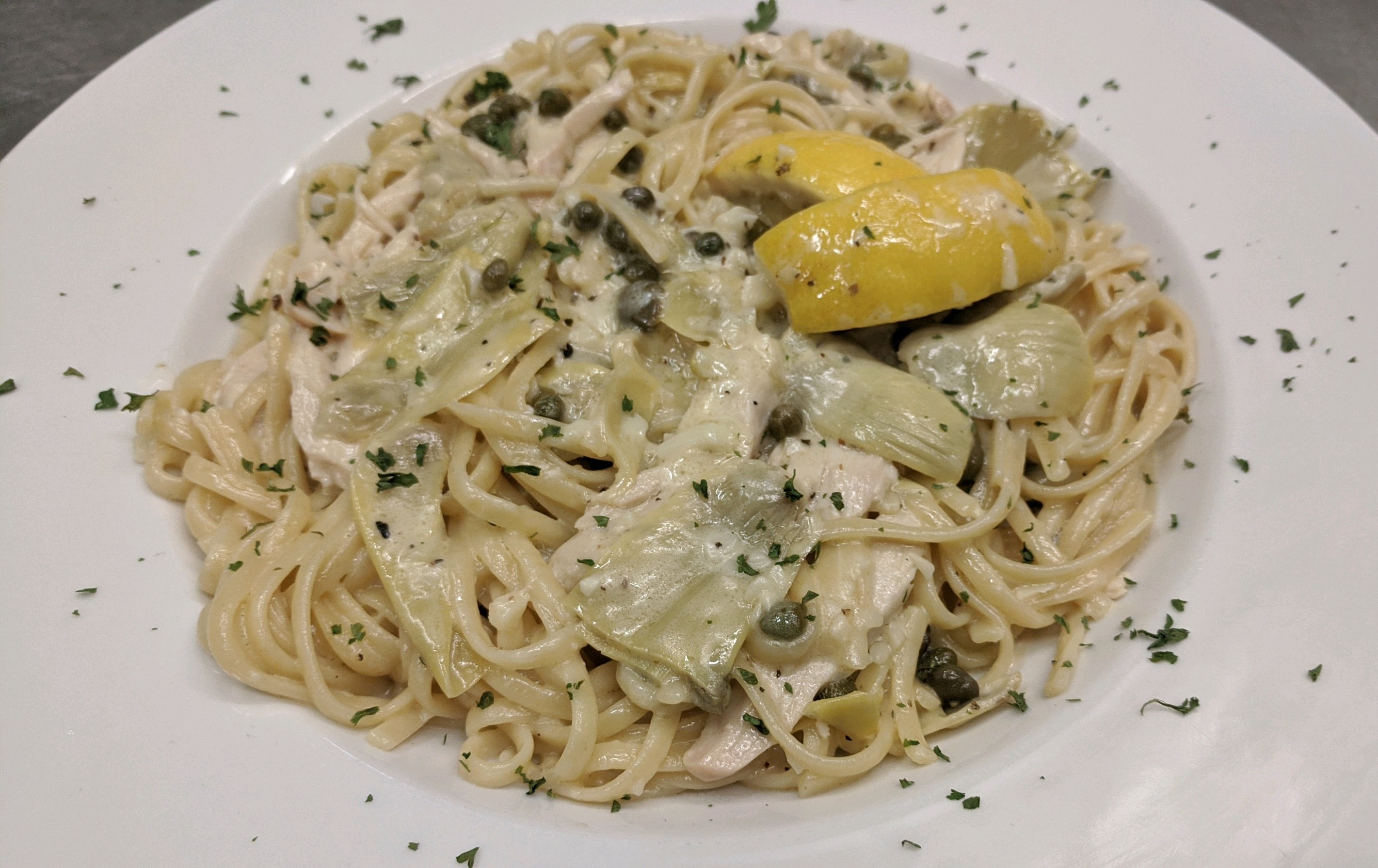 Order Creamy Lemon Chicken Piccata food online from Little Italy's Trattoria store, Vancouver on bringmethat.com