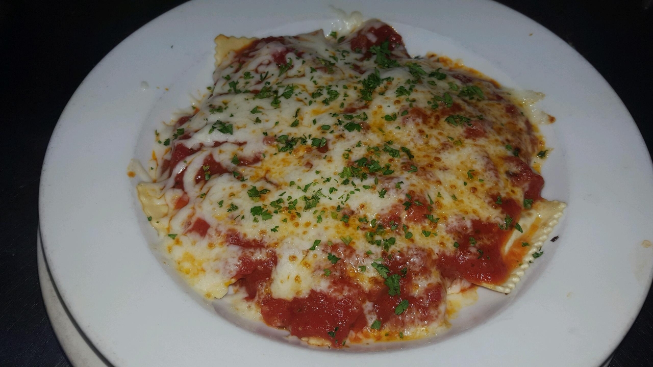 Order Baked Cheese Ravioli food online from Sutton's store, Lexington on bringmethat.com