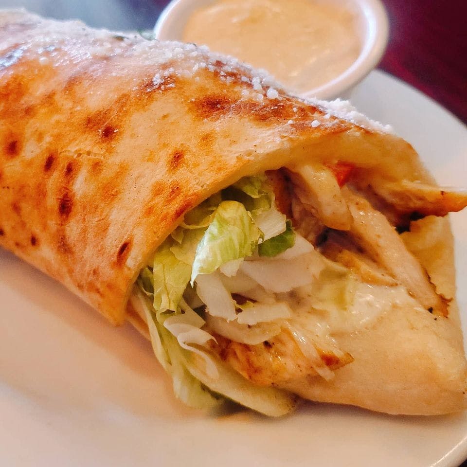 Order Chicken Caesar Pizza Wrap - Wrap food online from Piezano Of Northport store, Northport on bringmethat.com
