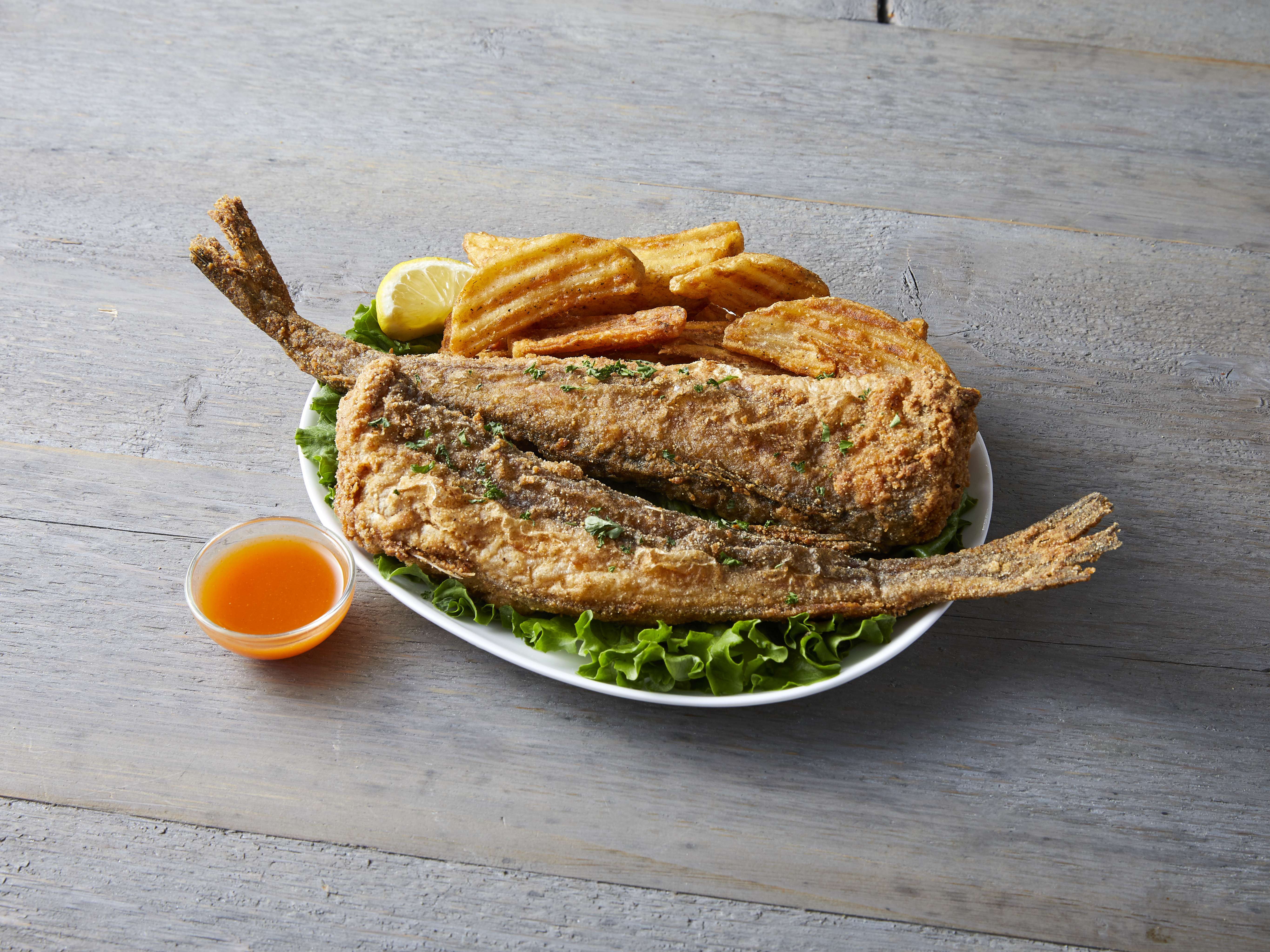 Order 2 Whole Whiting Fish food online from New Orleans Crispy Chicken store, Grand Rapids on bringmethat.com