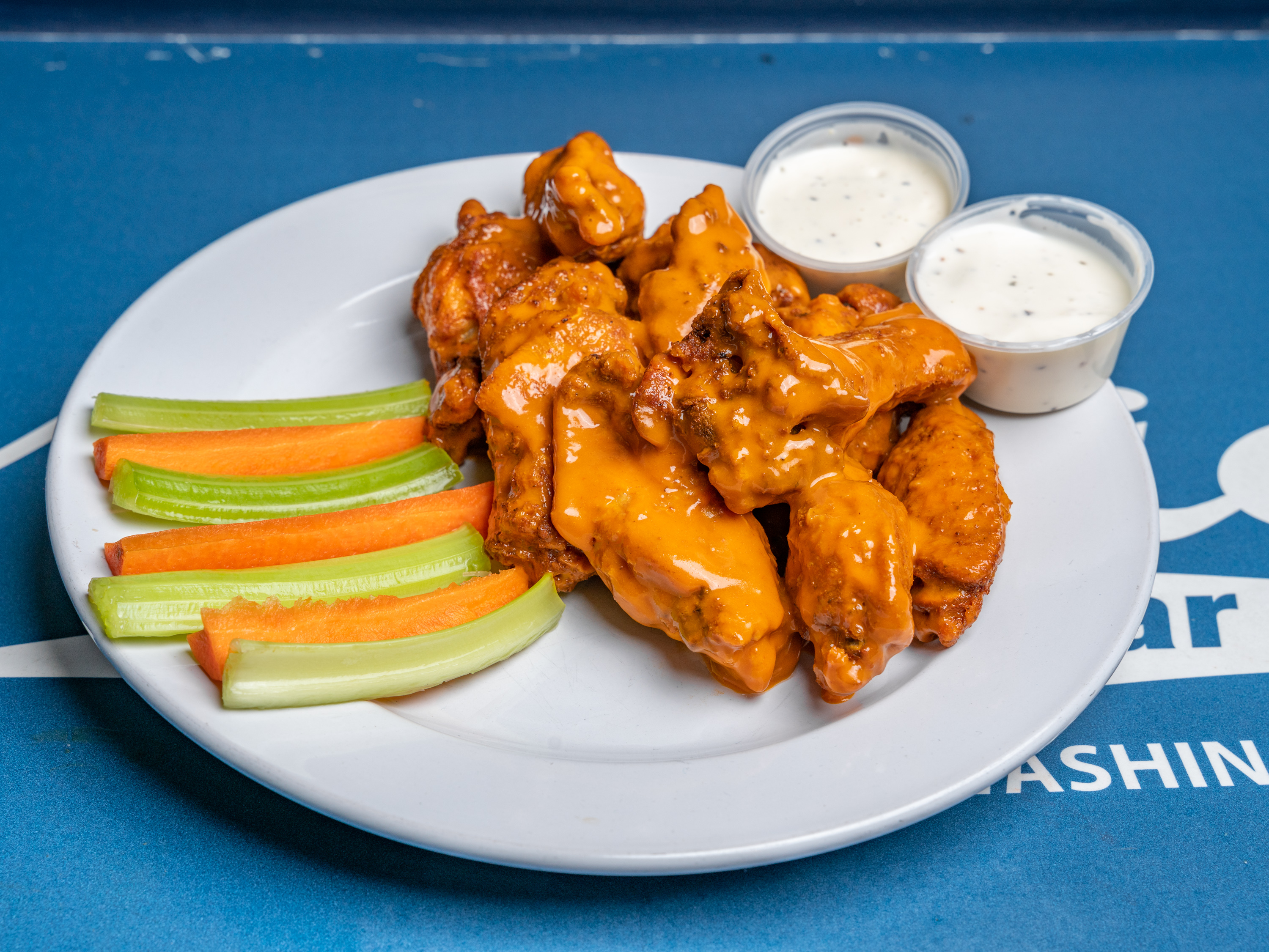 Order Nellie’s JUMBO Wings food online from Nellie's Sports Bar store, Washington on bringmethat.com