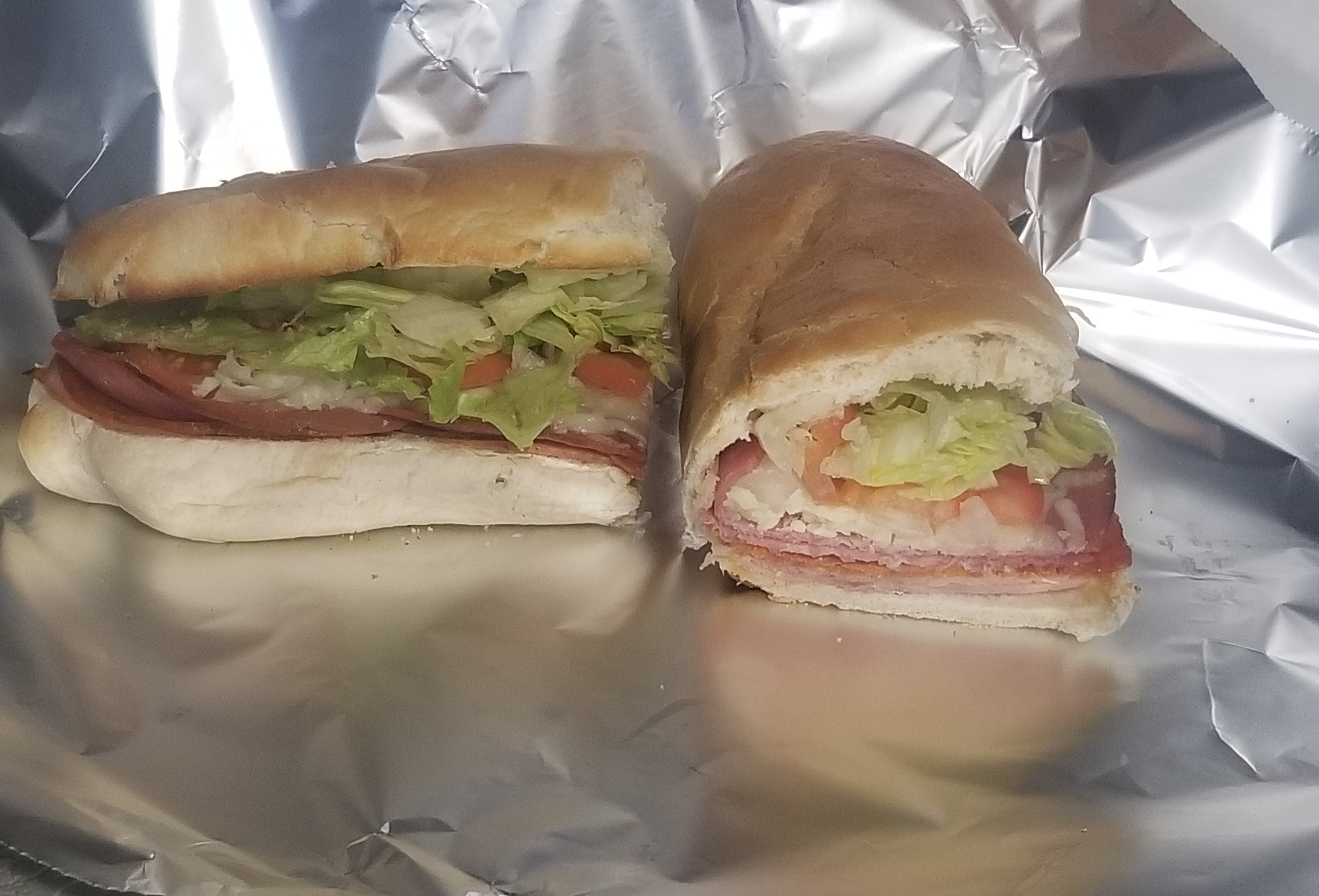Order Spicy Italian Sub - Sub food online from Novotny's Groceries & Pizza store, Worthington on bringmethat.com