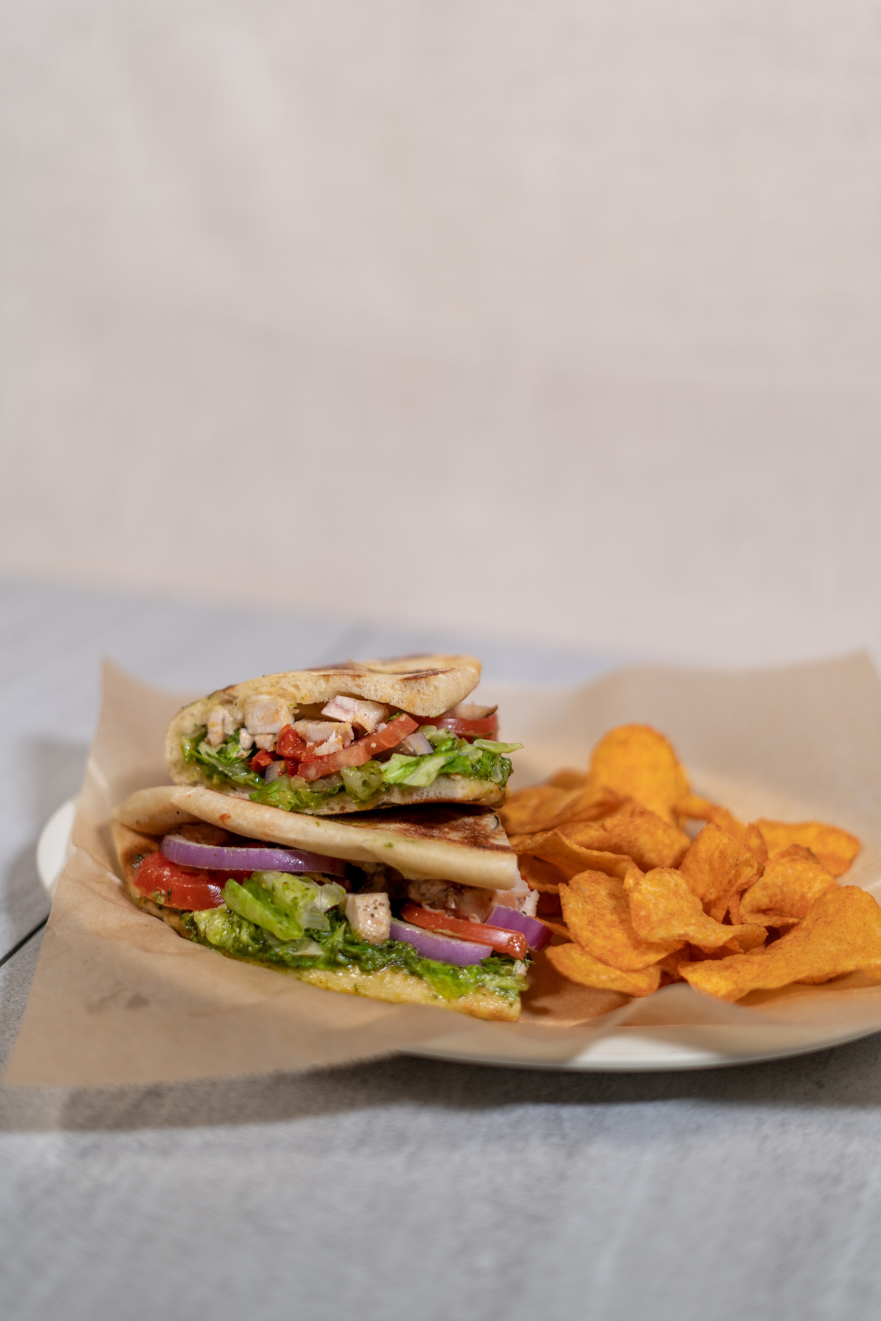 Order Pesto Chicken Sandwich food online from Flippers Pizzeria store, Clermont on bringmethat.com