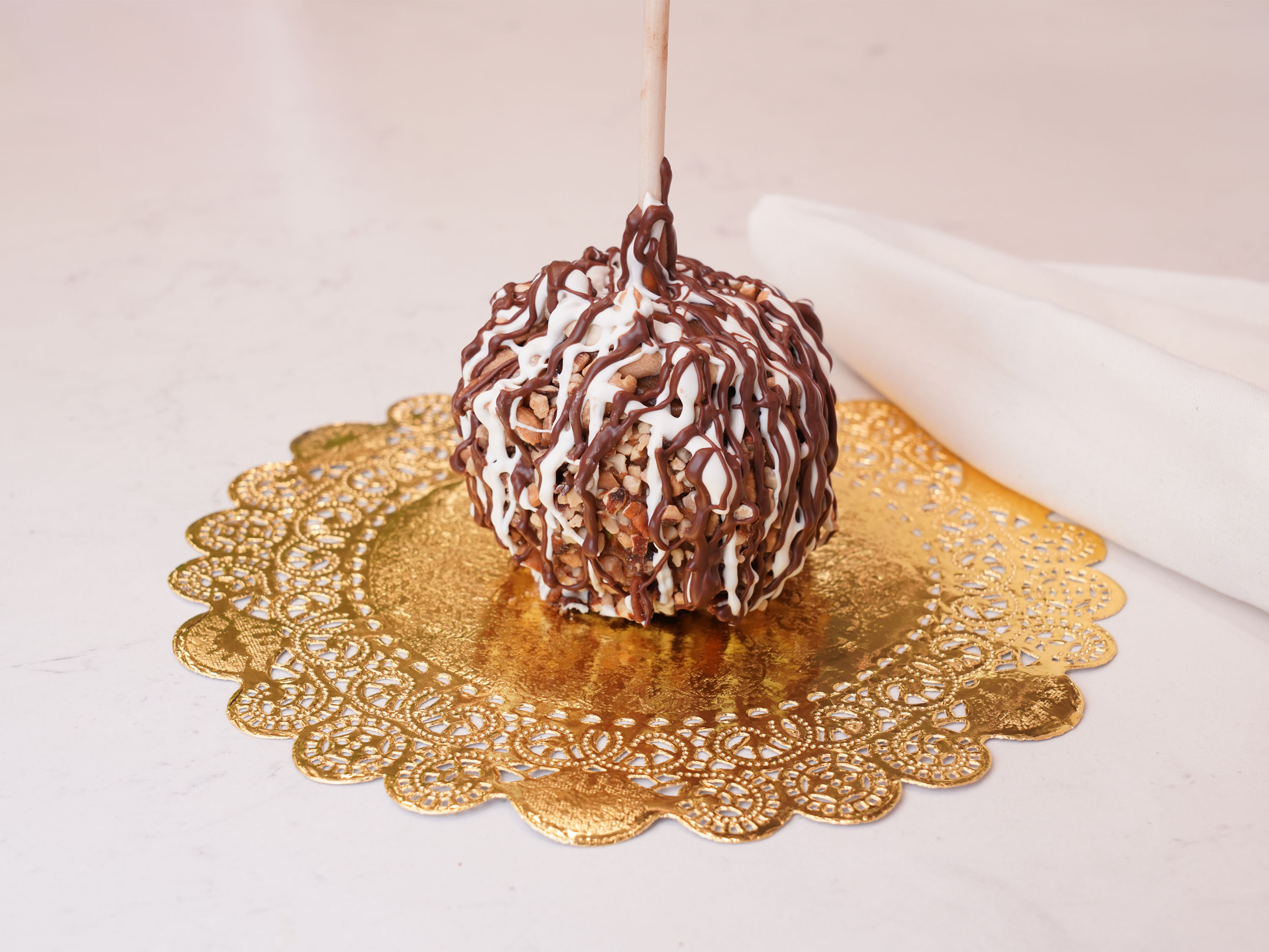 Order Tsunami Caramel Apple food online from Chocolate Wishes And Treats store, Clovis on bringmethat.com