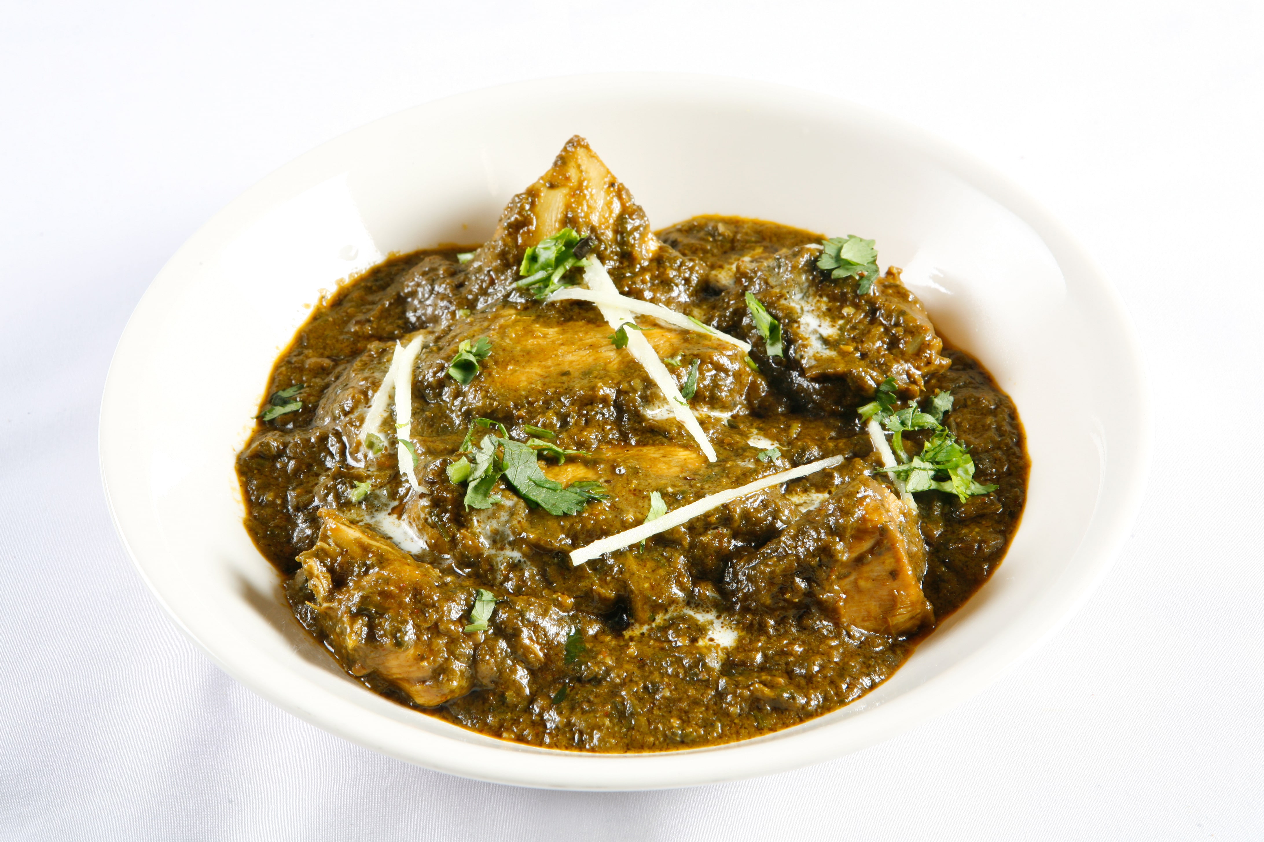 Order Lamb Saag(Boneless) food online from Tropical Curry And Grill store, Pflugerville on bringmethat.com